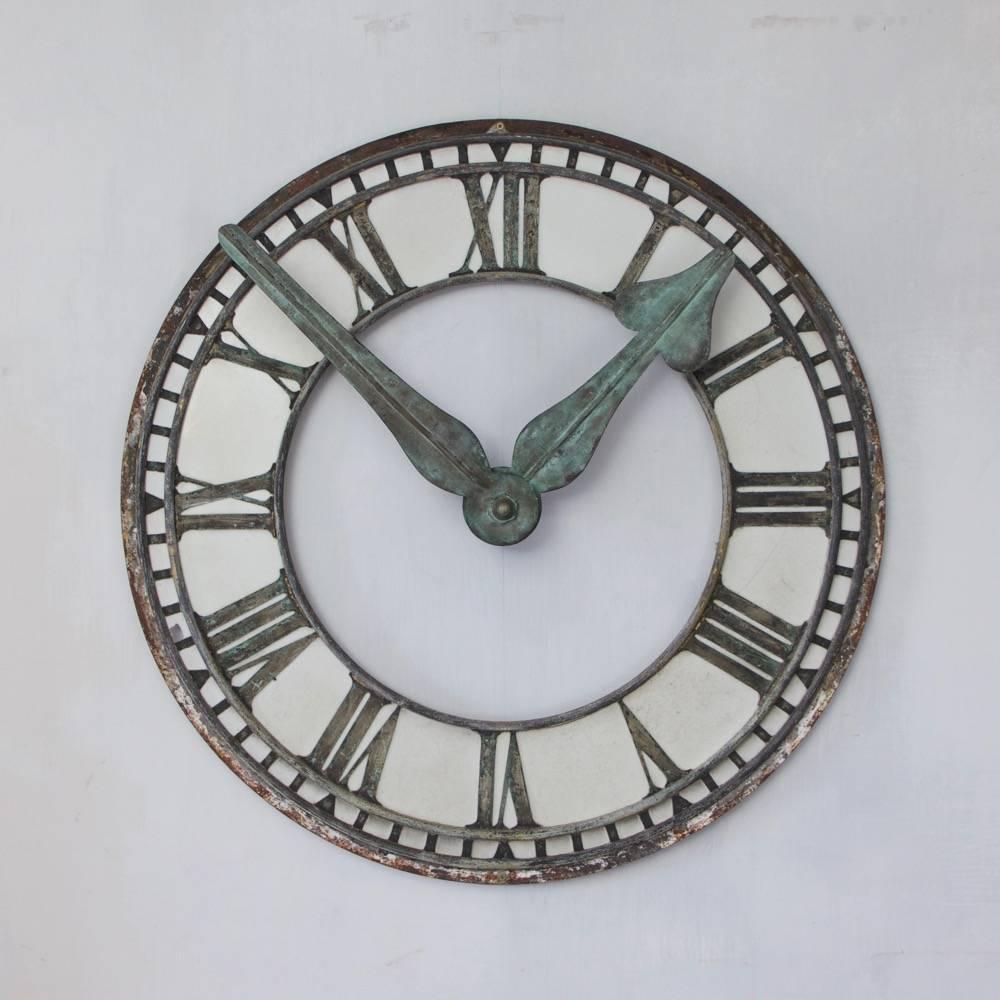 A rare verdigris copper and milk glass clock face from the original Acton tram station in London. England circa 1900. One small pane damaged and one pane with hairline break, please see last two images.