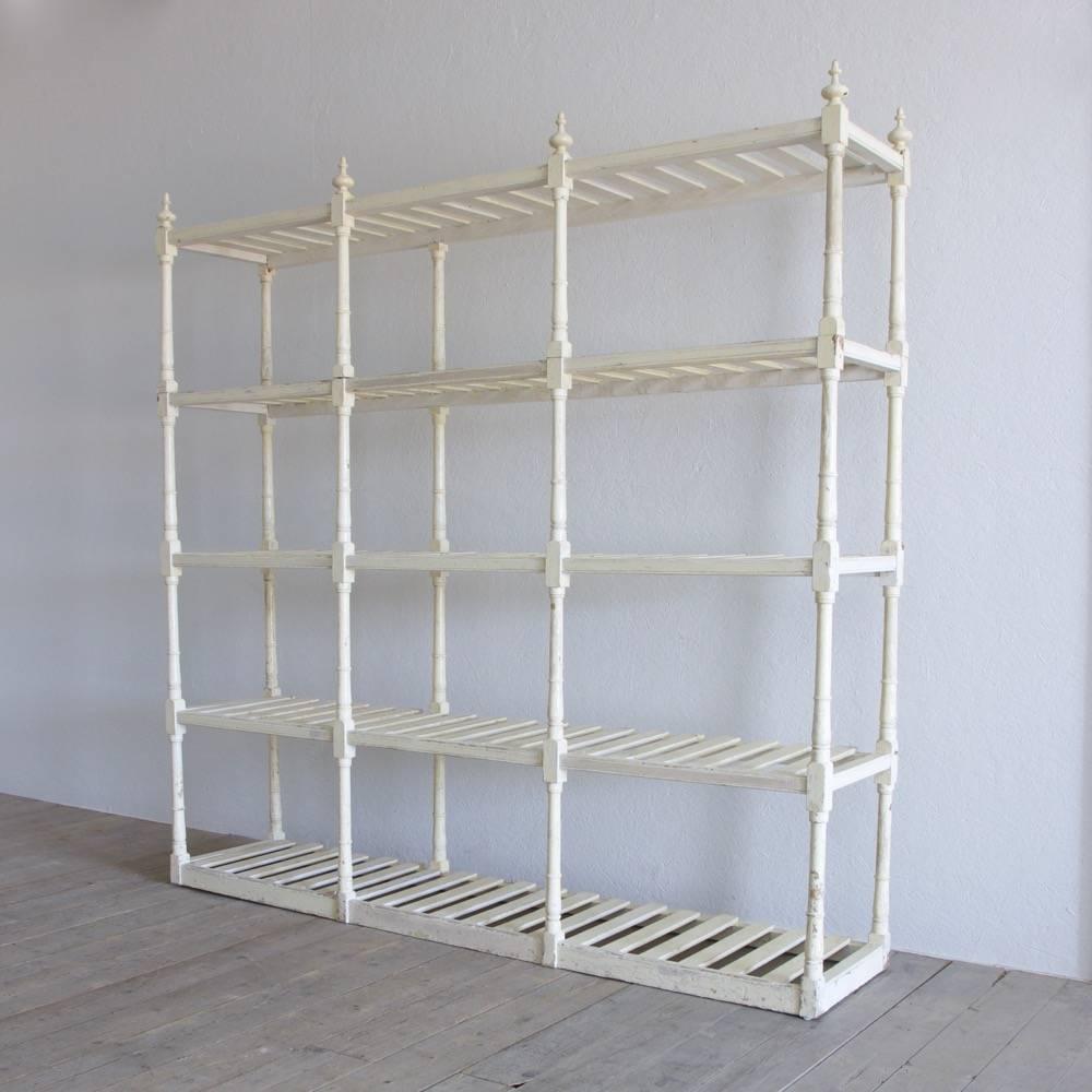 A large English country house linen rack retaining its historic painted finish, England, circa 1850. Top shelf can be removed for ease of transport.
  