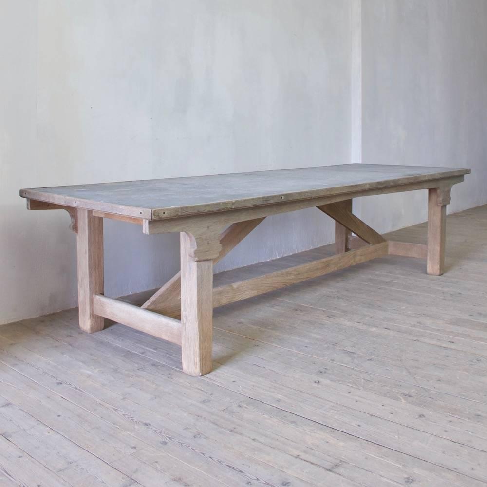 A great oak and zinc refectory table with weathered patination. England, late 20th century.