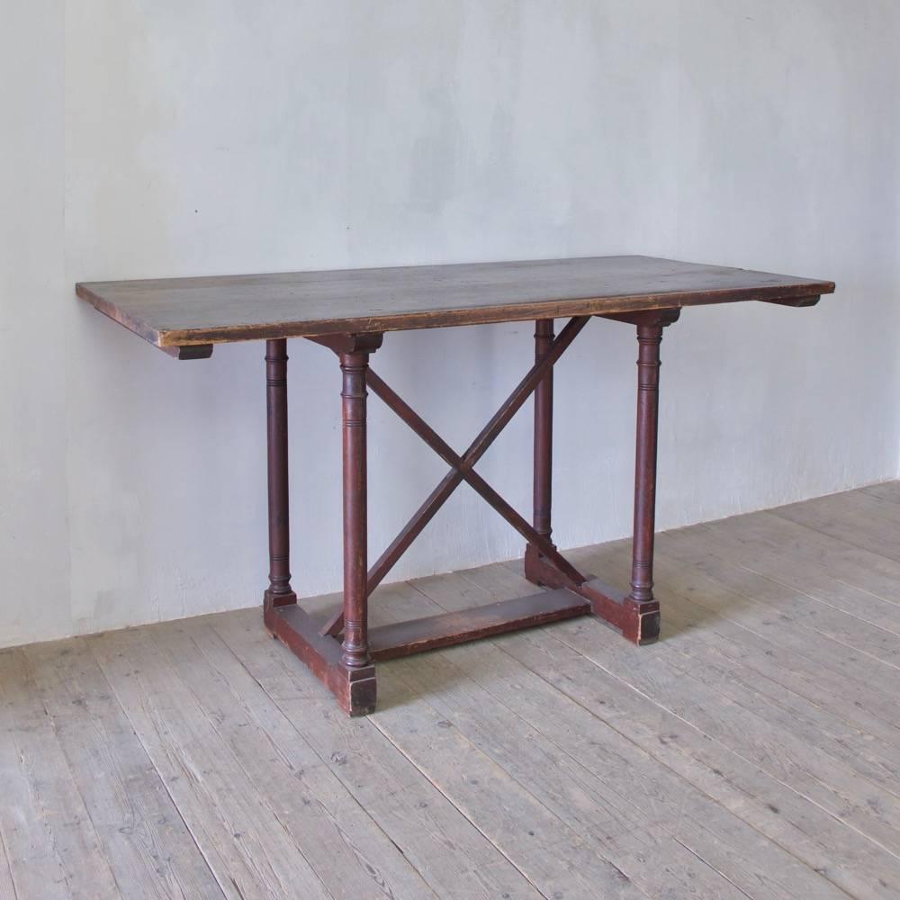 An rare architect's table of architectural form. Once had a drawer to either side, England, circa 1860.