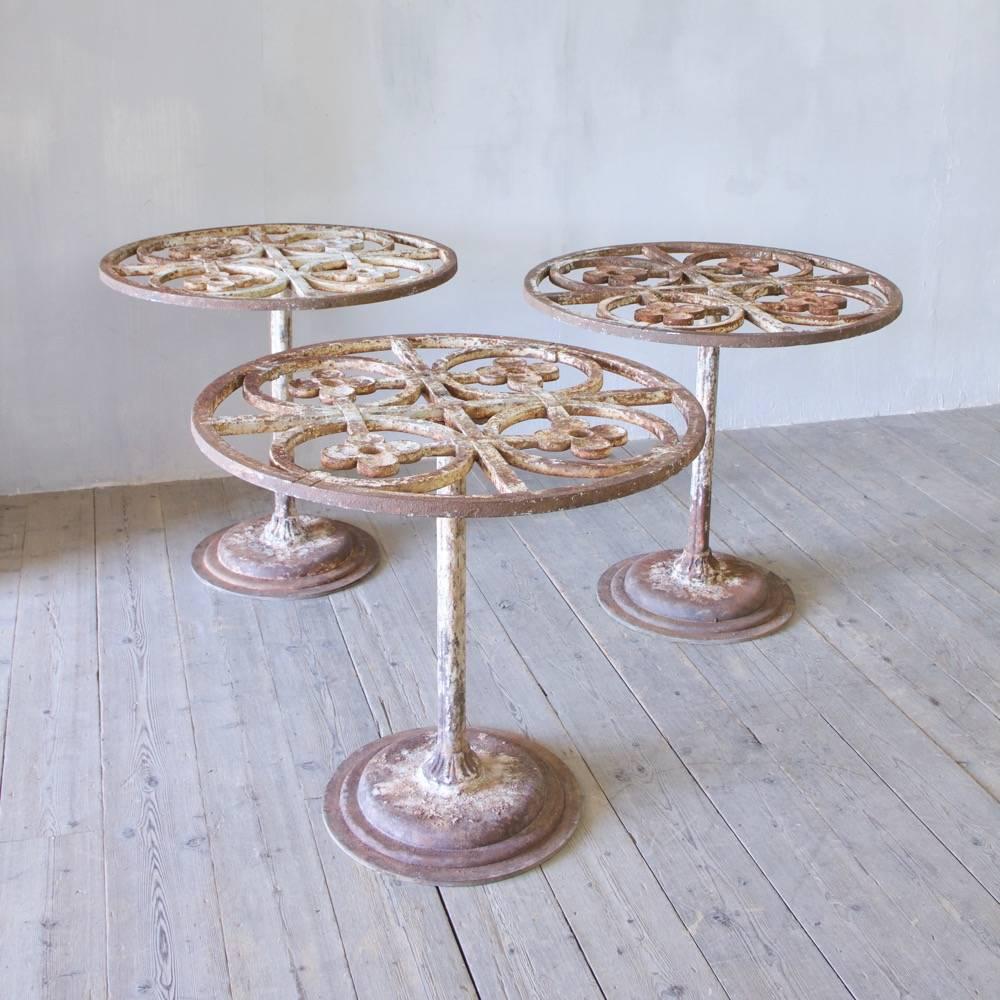 A fabulous set of three cast iron tables made from 19th century architectural fragments. Tops stamped W McFarlane, Glasgow, Scotland, circa 1860. Glass tops can be supplied cut to size.