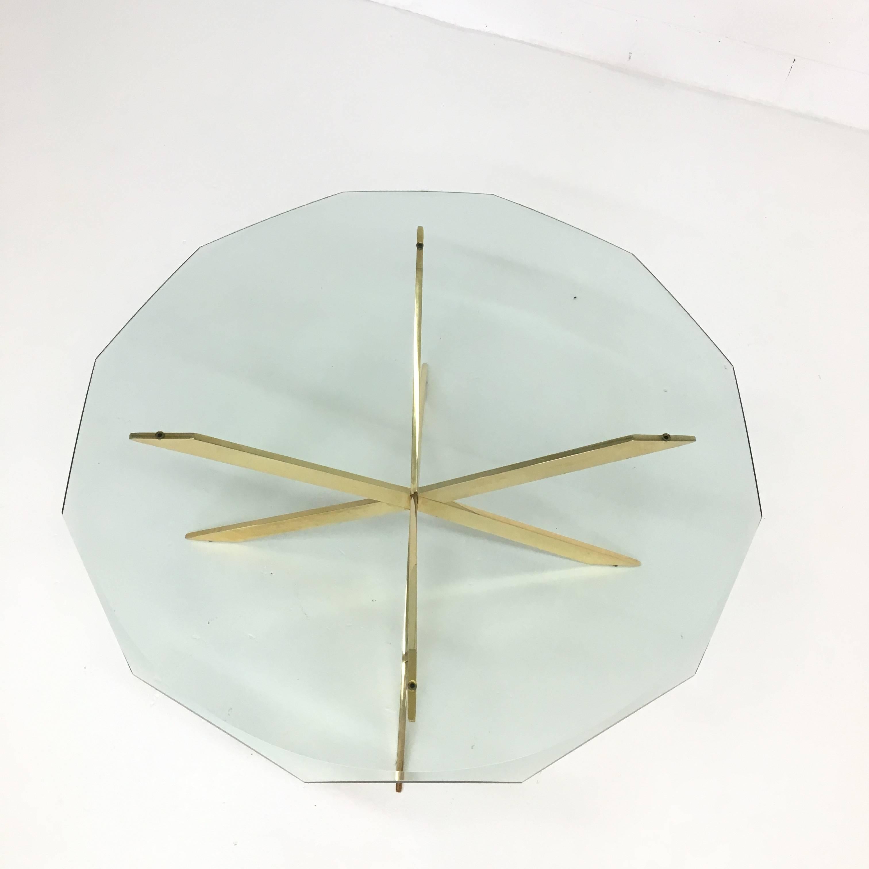 What a beauty! This Leon Rosen for Pace coffee table has no equal. Very rare brass double X-base with a 12/beveled edge thick glass top. Minimal age appropriate wear, glass has a few very minor scratches.