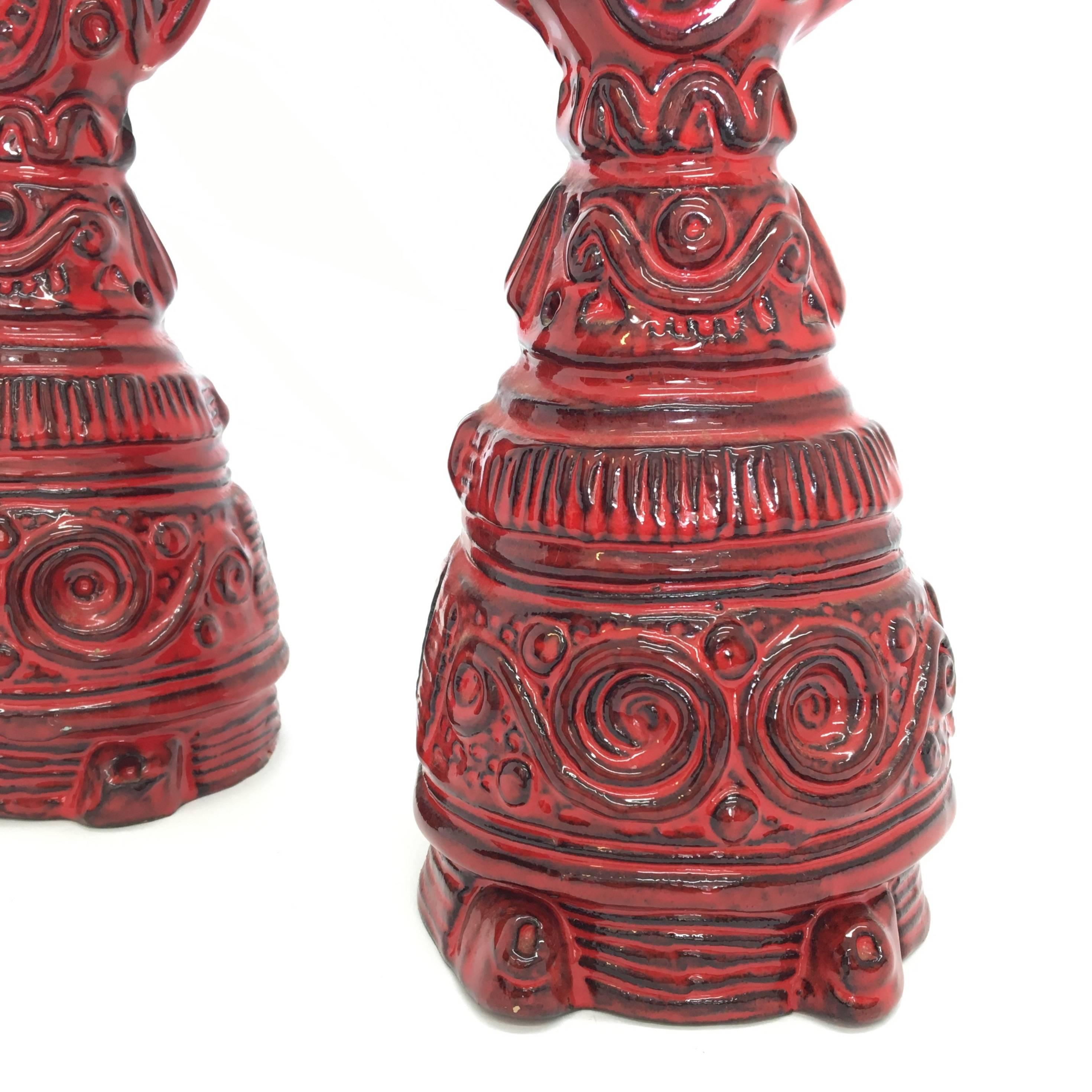 Pair of very rare Bitossi candlestick figurines in red.