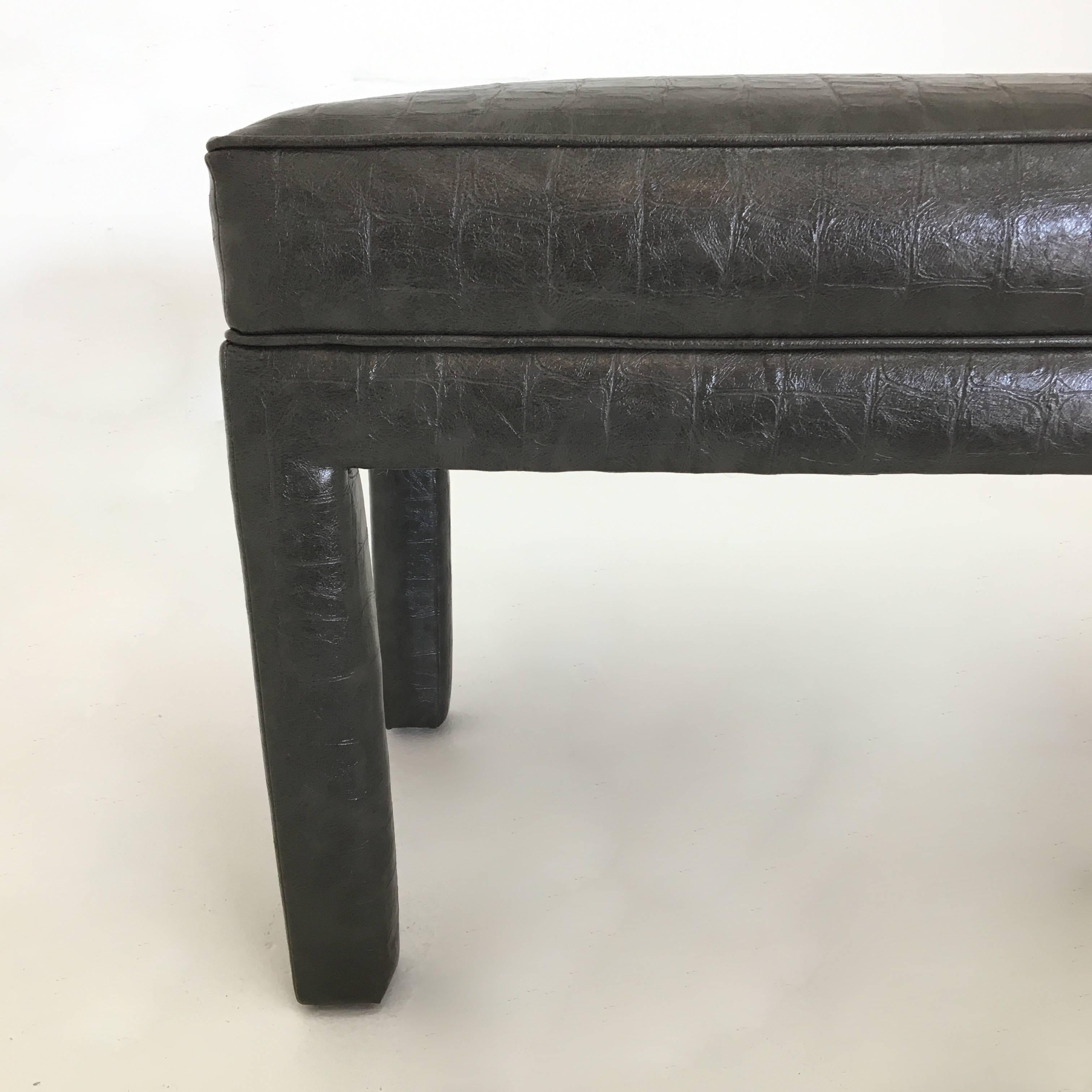 Reupholstered Parsons bench in faux crocodile vinyl.
 
