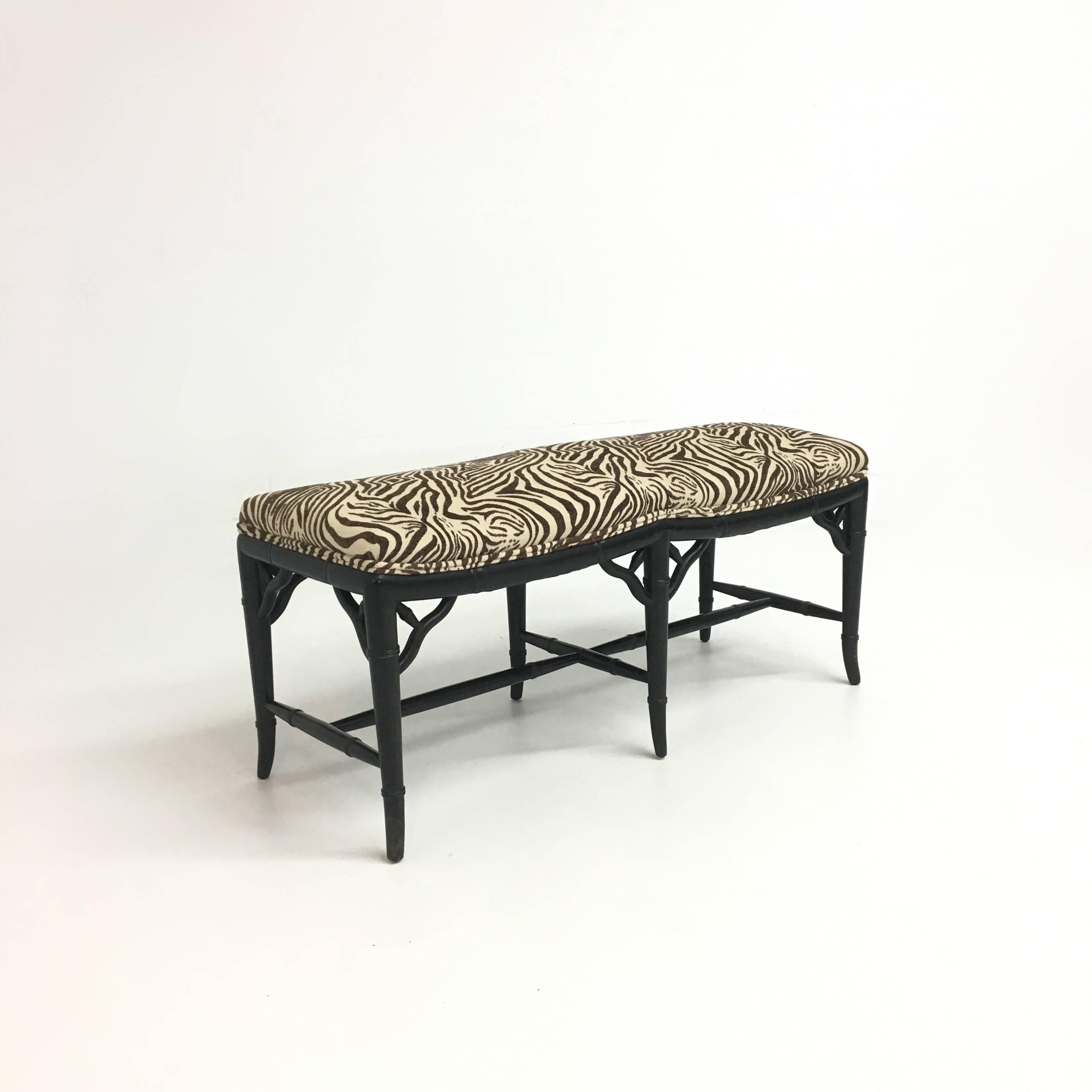 Mid-Century six legged black faux bamboo bench with newly upholstered seat in zebra raised chenille. 

Frame has some age appropriate wear.
 