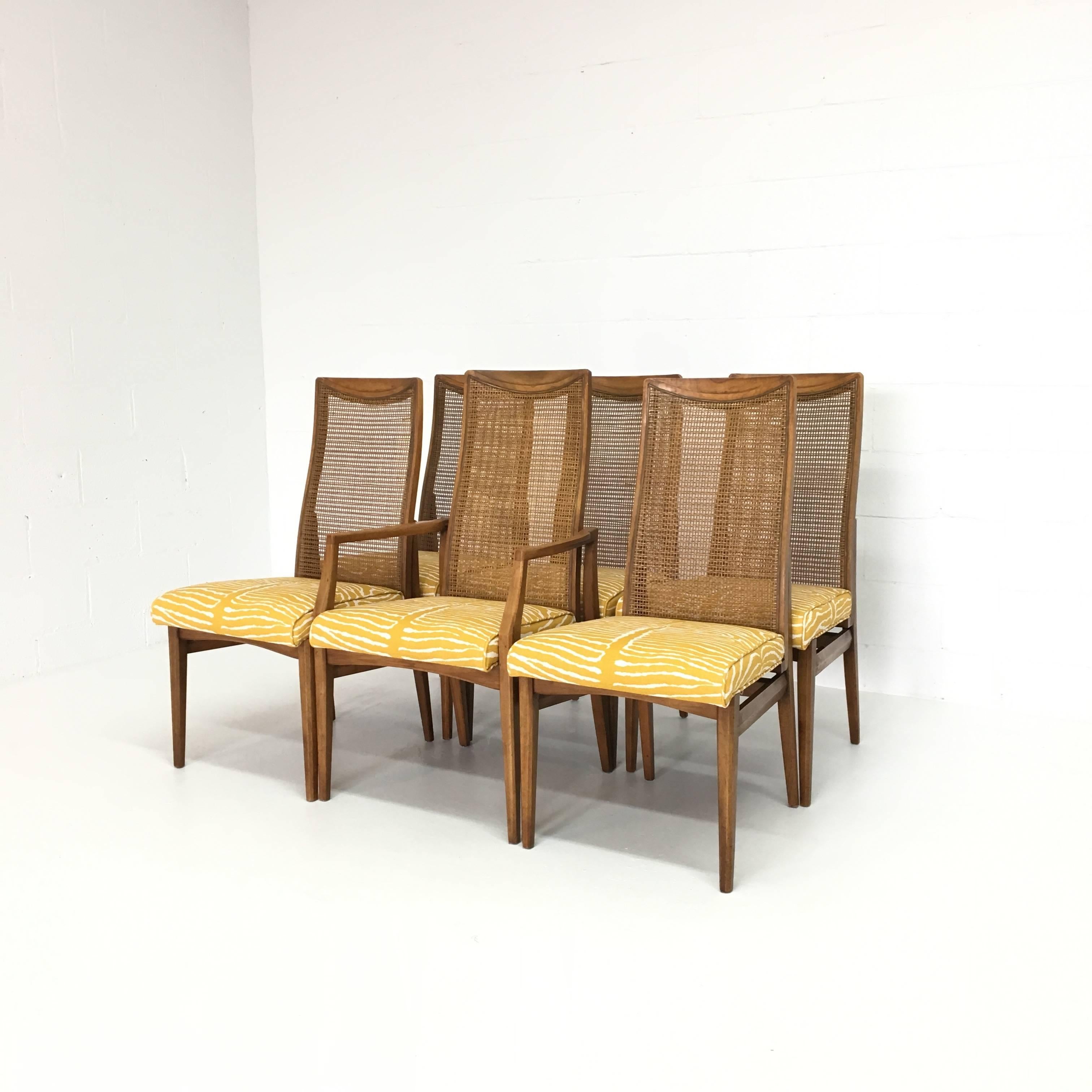 Set of six caned back Mid-Century Modern dining chairs. Newly caned and newly upholstered with Schumacher zebra print fabric. One captain and five side chairs.
 
Measurements:
Captain: 22