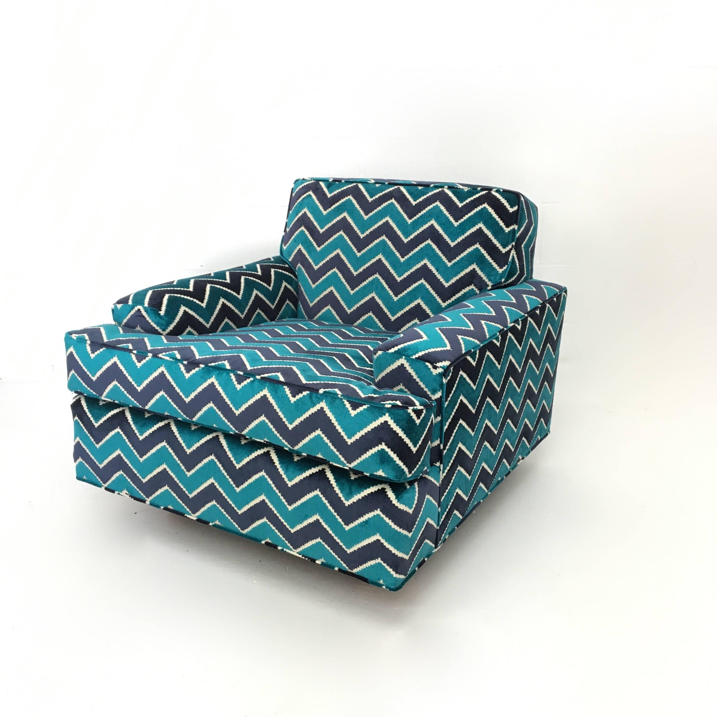 Mid-Century Modern retro zig zag pattern newly upholstered lounge chair in turquoise and navy.