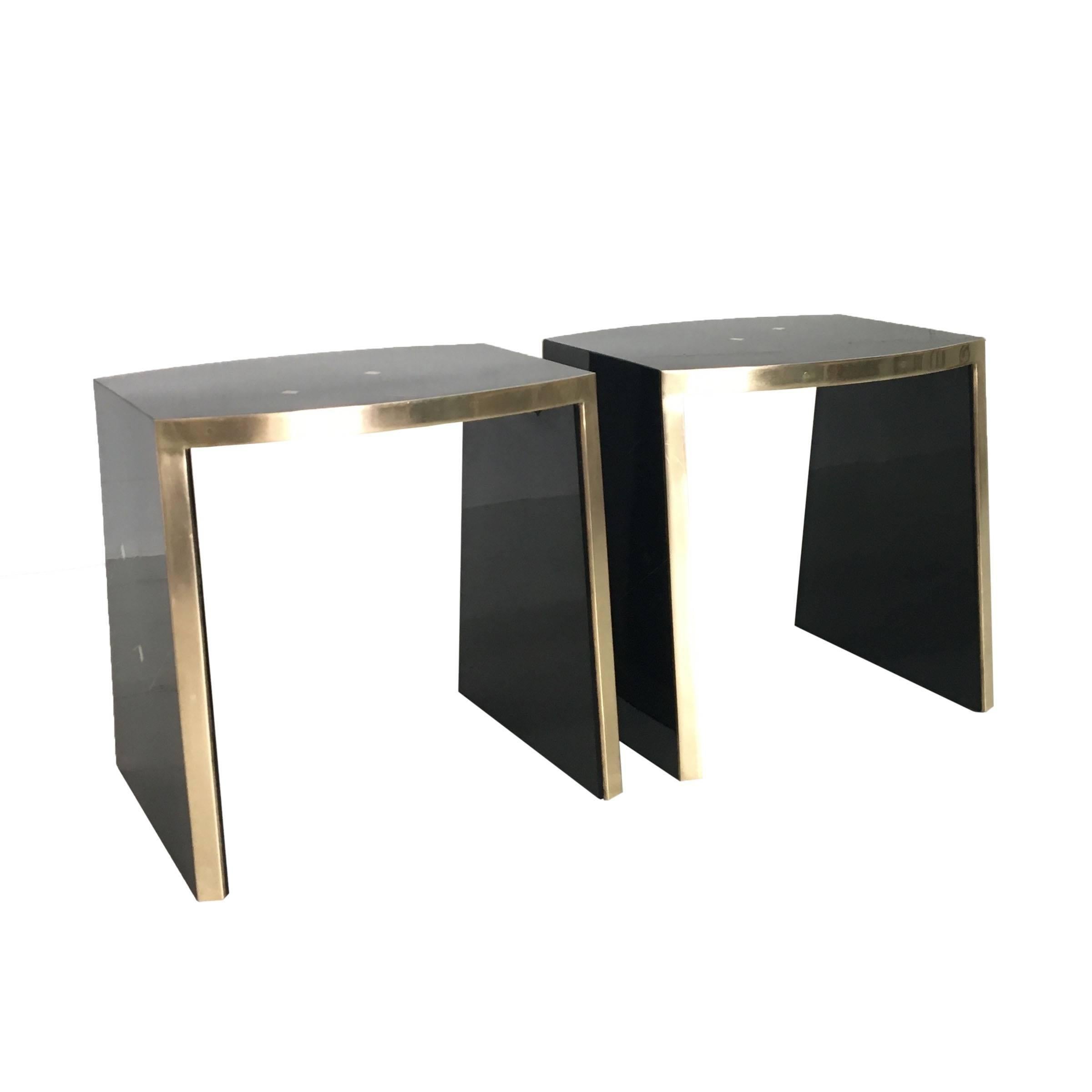 A pair of amazing Ron Seff side tables in black lacquer, mother-of-pearl and 24-karat gilt framing. Some age appropriate wear on the lacquer finish.

Ron Seff was a designer most notable for his collections in the 1980s, epitomizing glamour with the