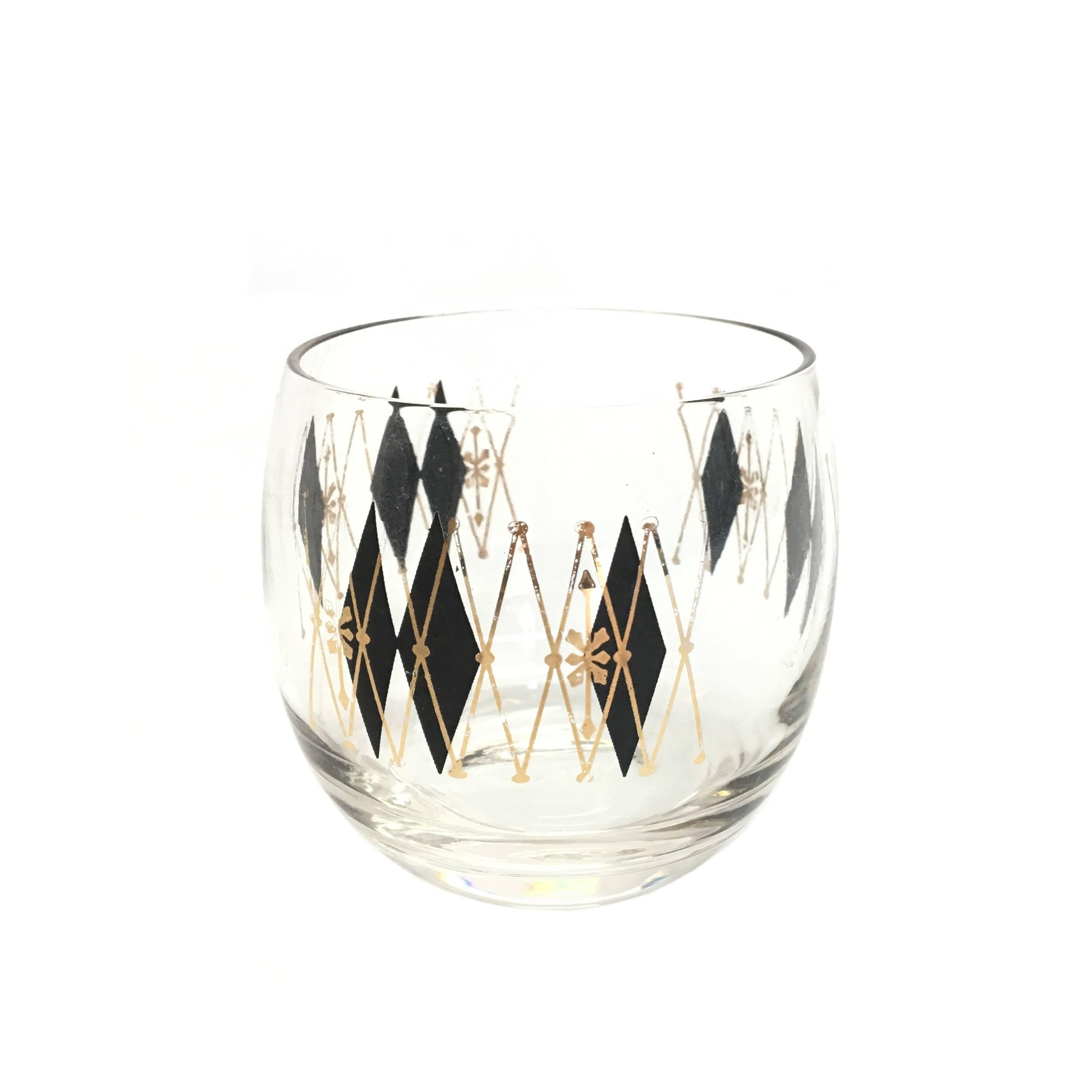 Mid-Century atomic harlequin black diamond roly poly glassware and caddy by Federal Glass Barware.
Measurements:
Carrier: 15.5