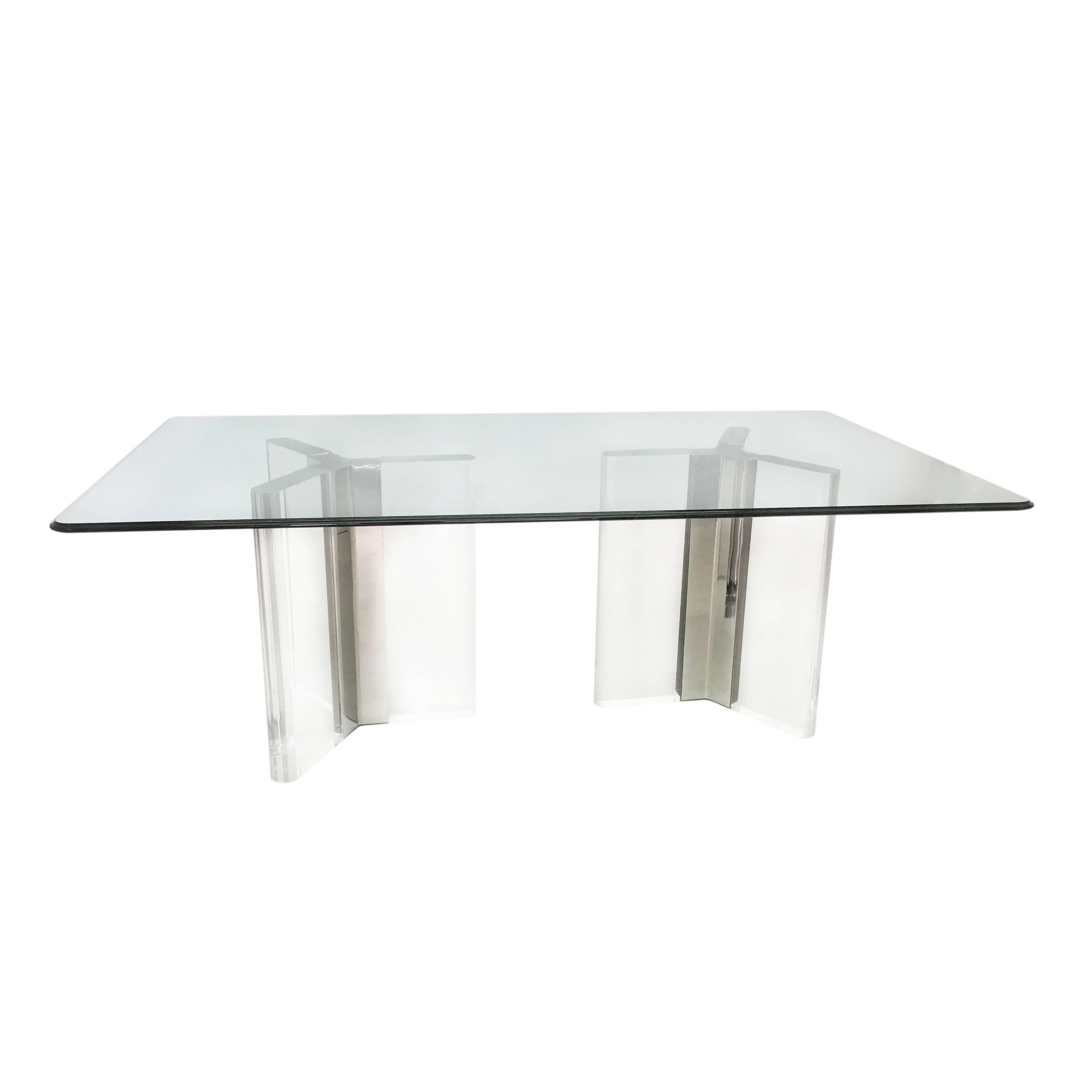Substantial Mid-Century Modern/Hollywood Regency Lucite and chrome based, glass topped dining table similar to that of Leon Rosen for Pace. Lucite and chrome in excellent condition with one or two minor blemishes. Slight scratching on glass top. Age