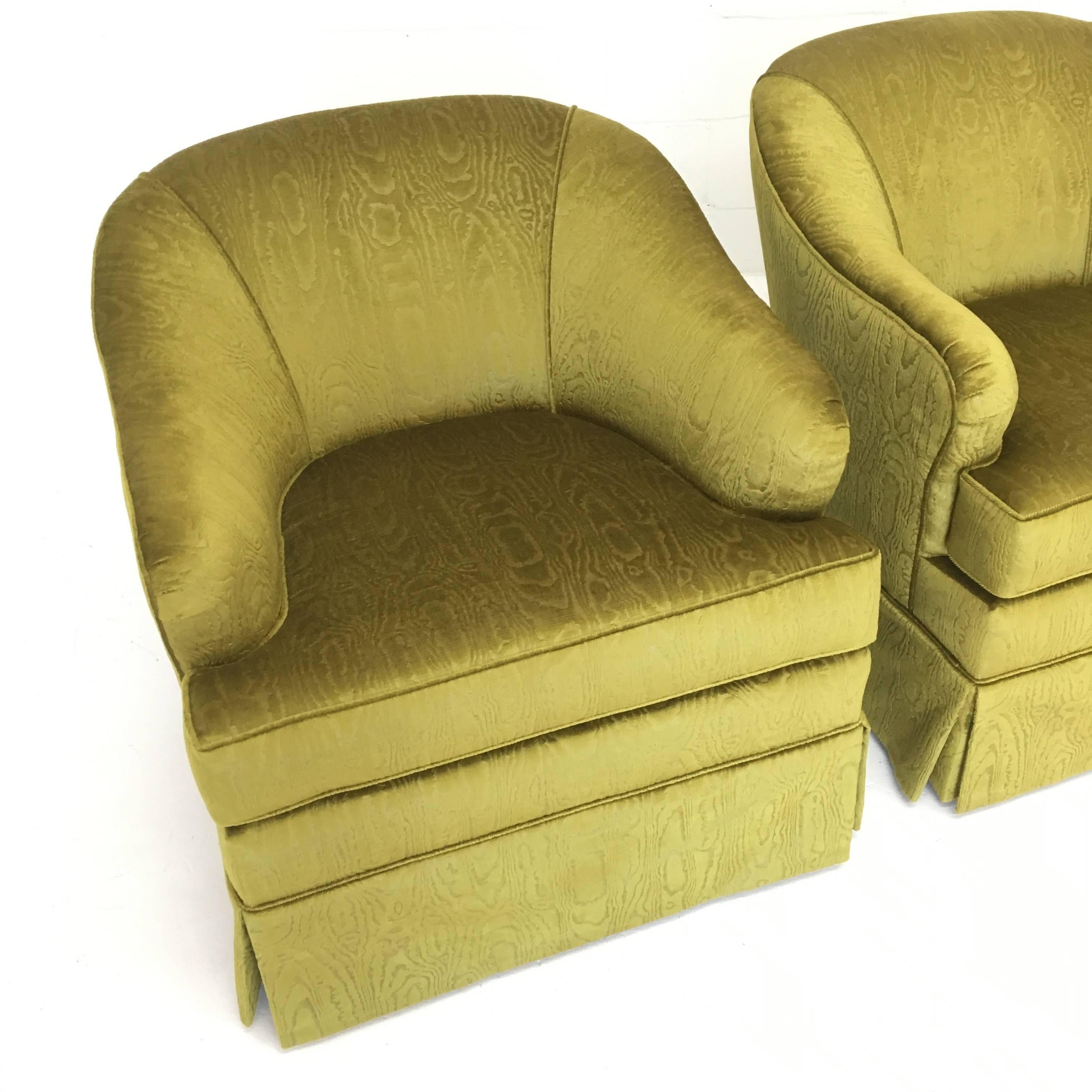 Mid-Century Hollywood Regency style club chairs. Newly upholstered in vibrant chartreuse moire velvet. Fabric swatch available.