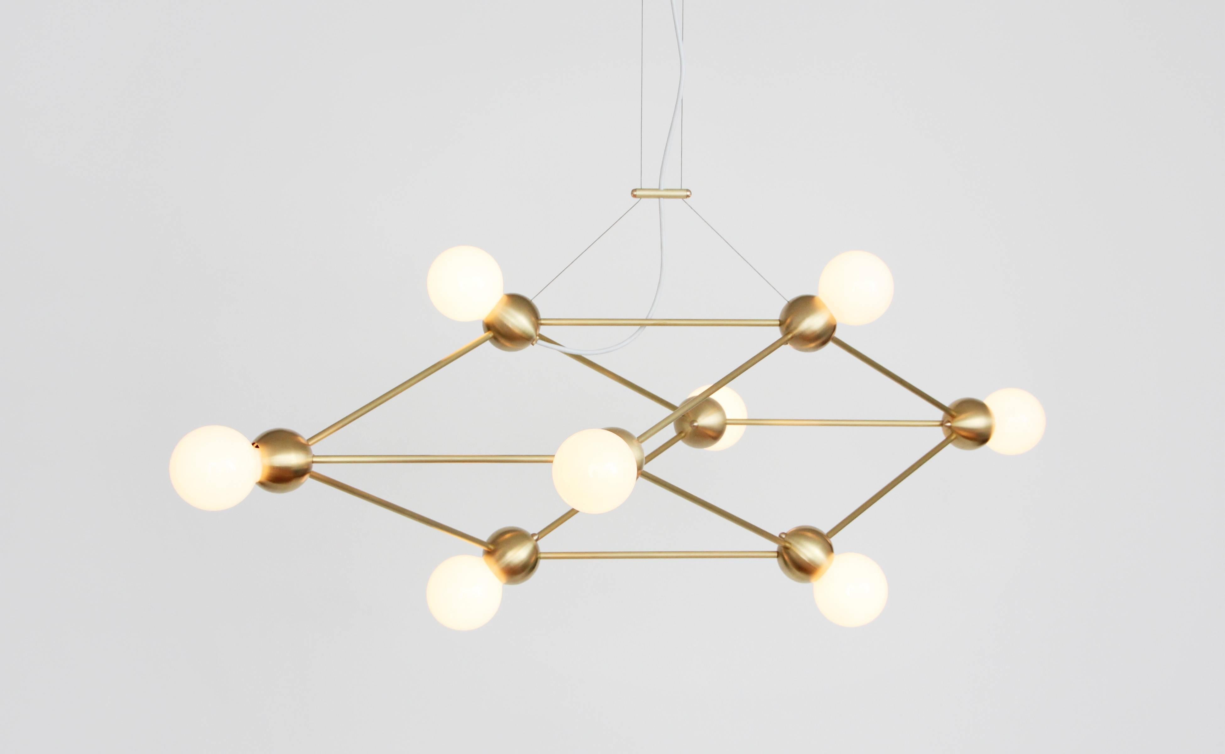 Inspired by 1960s Italian lighting, Lina is an all-brass lighting system designed to create airy geometric fixtures.

Each welded brass sphere joins with solid brass tubing and minimal fastener hardware to form strikingly simple hanging fixtures