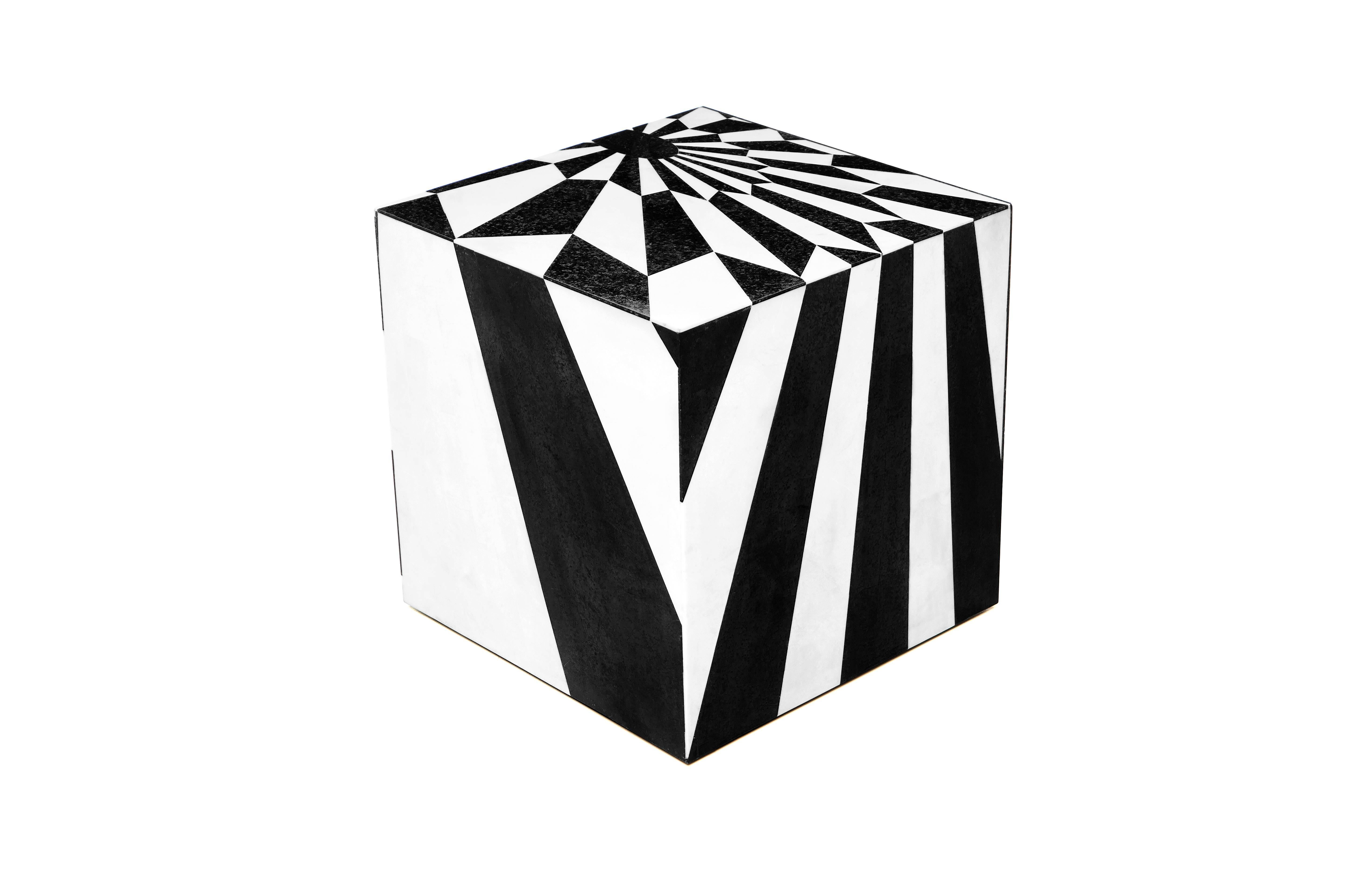 The tectonic silence cube, an unusual and dynamic piece of furniture, is covered in magnificent marble marquetry trompe-l’oeil design geometric pattern resulting in a fascinating illusion of depth. This noble technique consists of hand-cutting