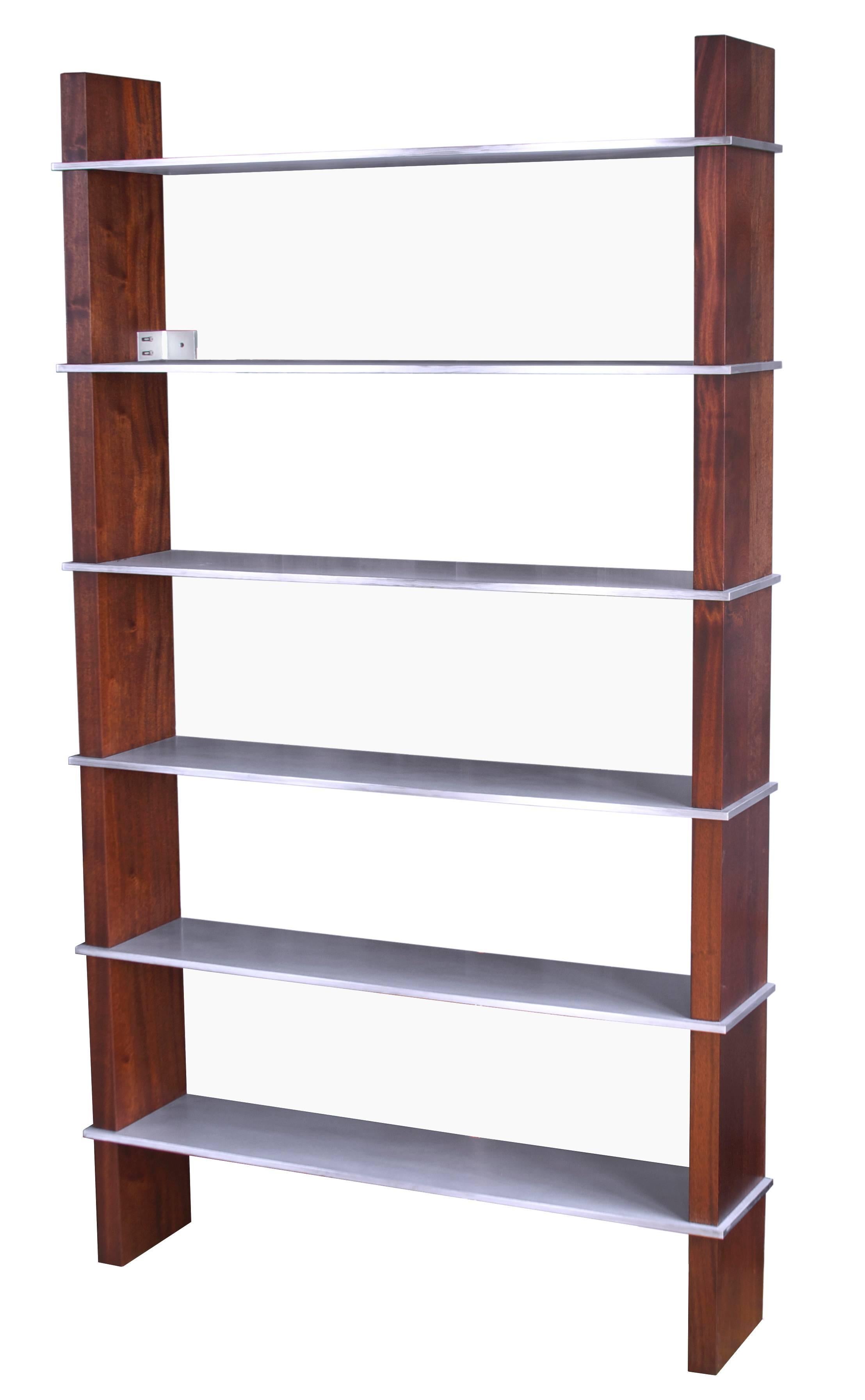 The Biblios bookcase with intersecting solid walnut verticals with 1/2” solid aluminum shelves. 

The modern campaign collection by Richard Wrightman combines the vernacular of traditional form with a modern aesthetic, mixing memory with invention,