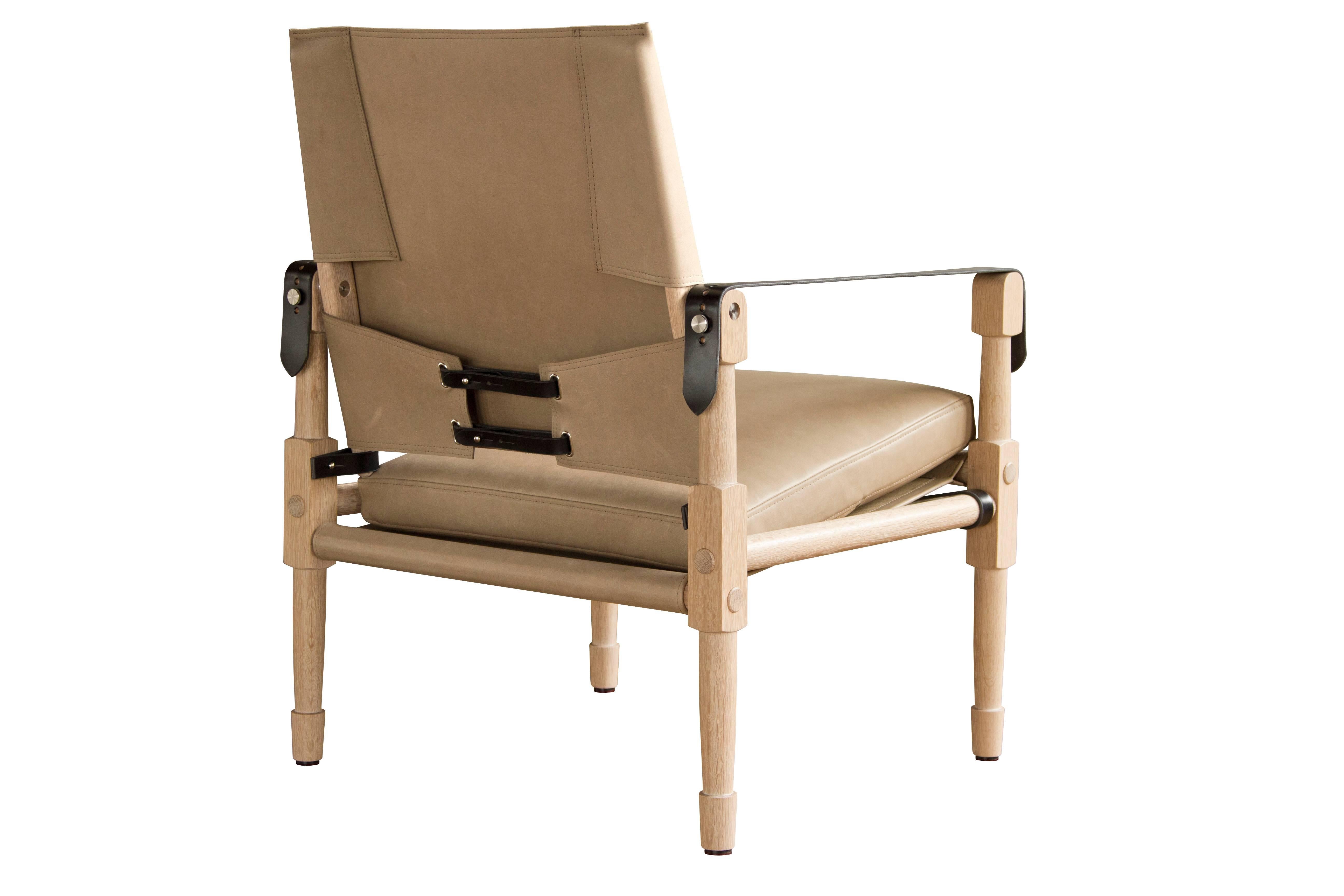 The Grand Chatwin Lounge Chair, in bleached white oak with Moore and Giles: Valhalla / Burlap leather upholstery and black English bridle leather strapping.

The modern campaign collection by Richard Wrightman combines the vernacular of traditional