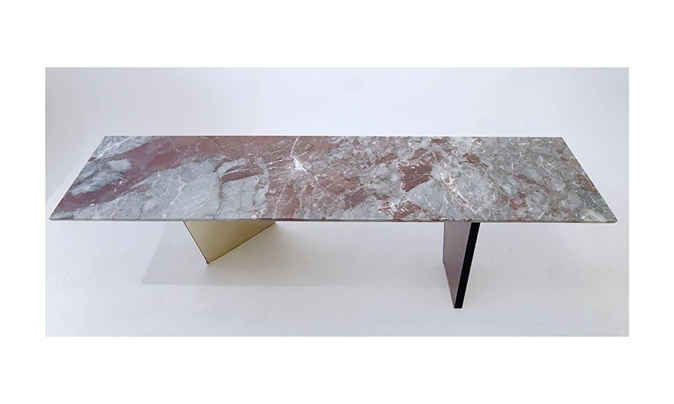 Low table Akira

Designed by Abarchitects
Florence, Italy, 2017

Materials: Italian marble, brass, smoked violet perspex 
Contemporary “Akira” low table, consisting in a matt smooth top in “fiore di pesco” marble slab, supported by an