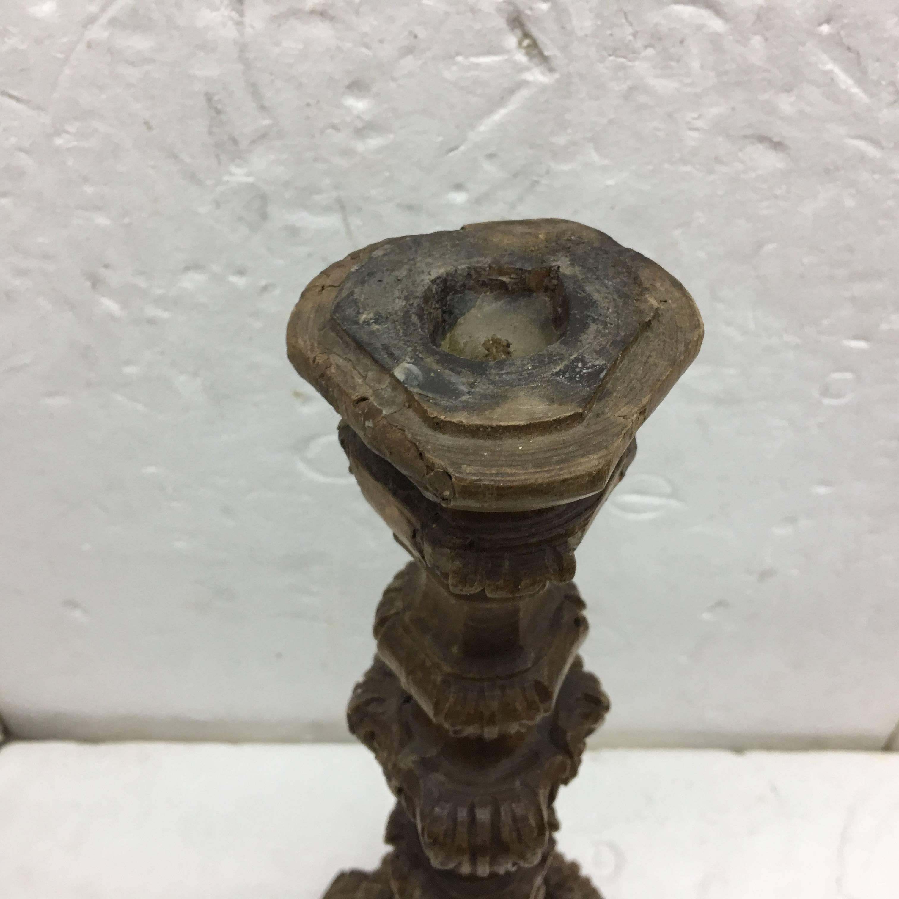 This is a Baroque Revival wood candlestick entirely hand-carved in original conditions.
