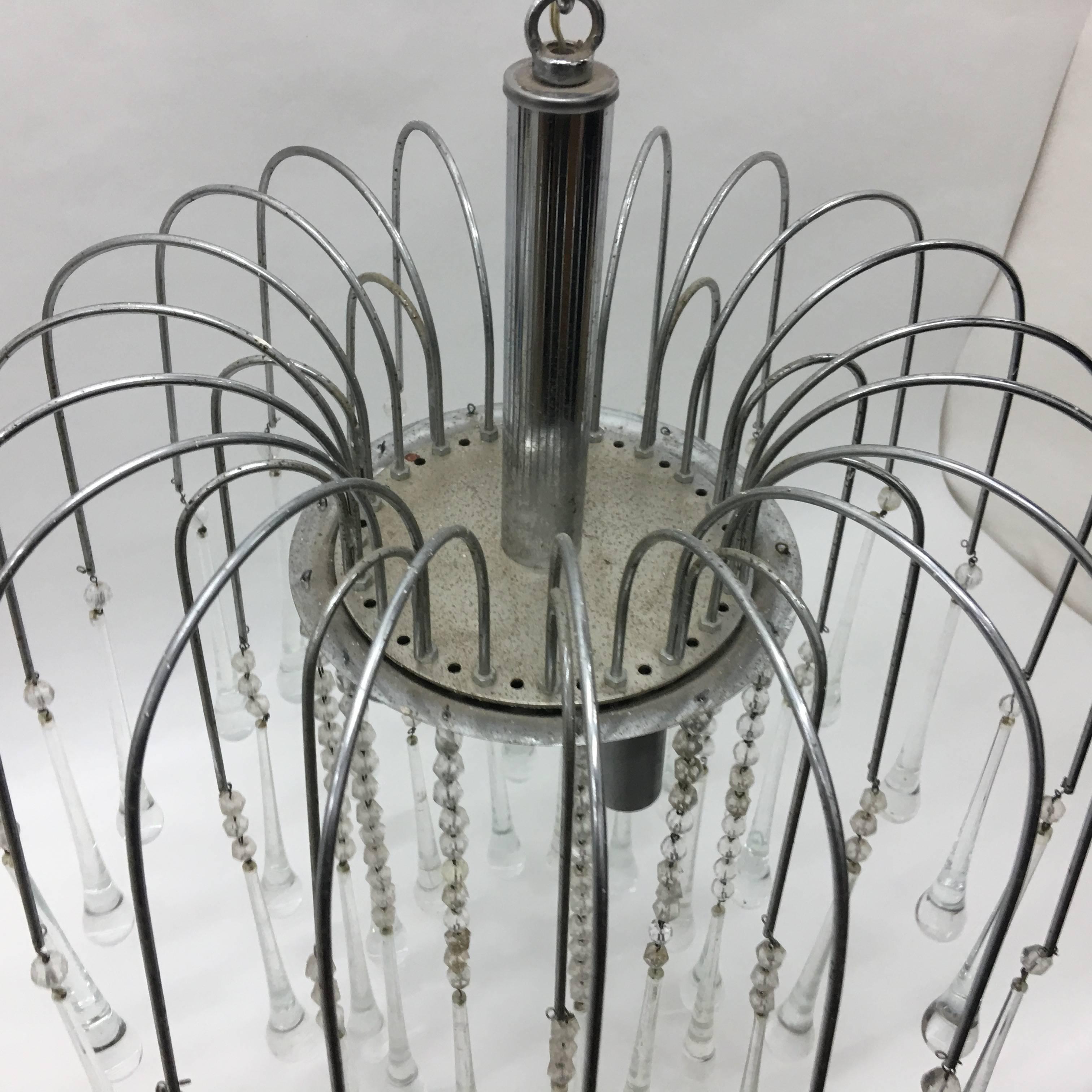 This is a lovely chandelier made in Italy in the 1960s, fully restored electrical parts, complete in all its parts. it works with both 110 and 220 Volt.