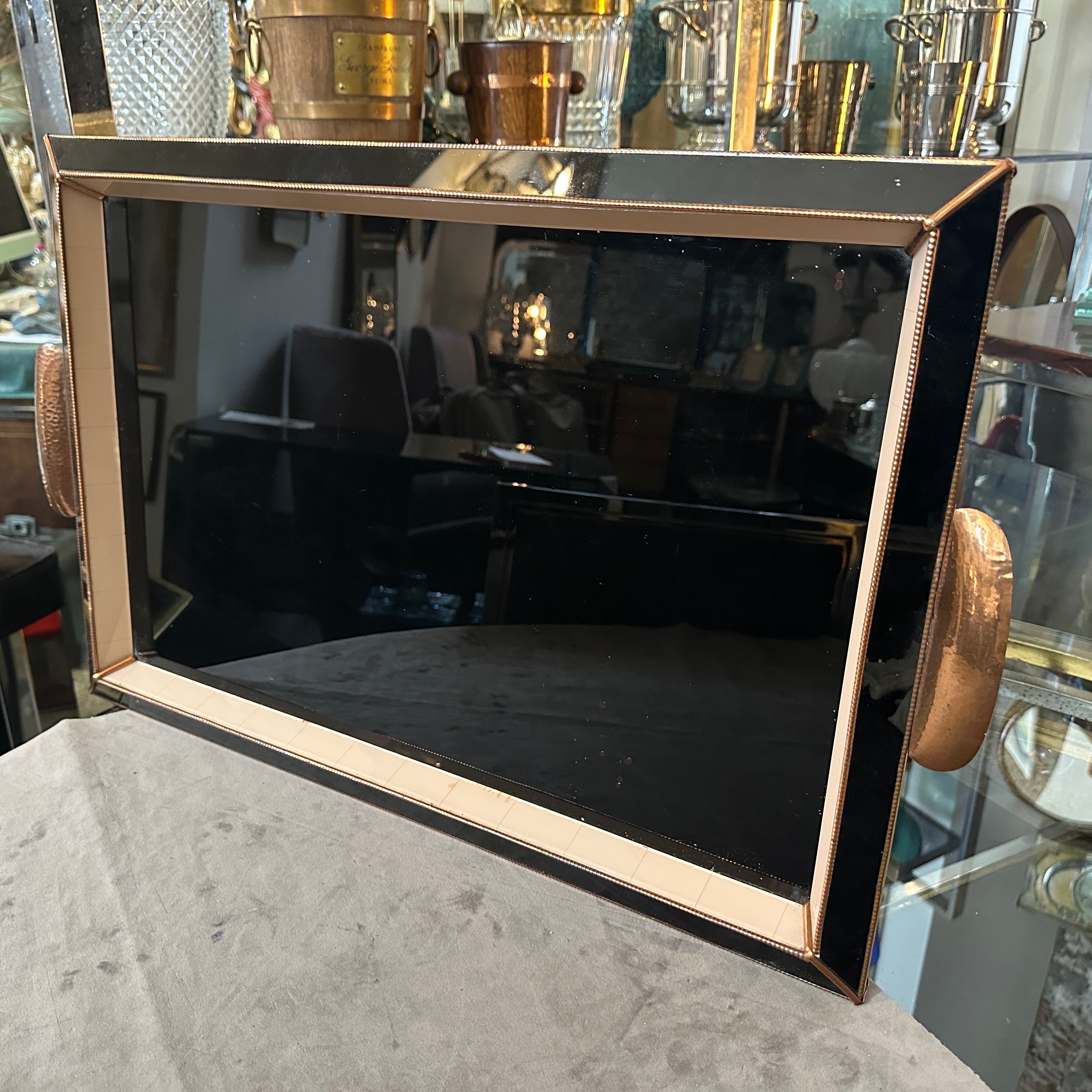 Exceptional 1930s Art Deco Copper and Black Glass Rectangular Italian Serving Tray
Presenting a remarkable piece of Italian Art Deco history, this high-quality rectangular serving tray dates from the 1930s and embodies the sophisticated glamour of