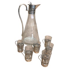 A 1900s Art Nouveau Sterling Silver and Engraved Crystal Liquor Set