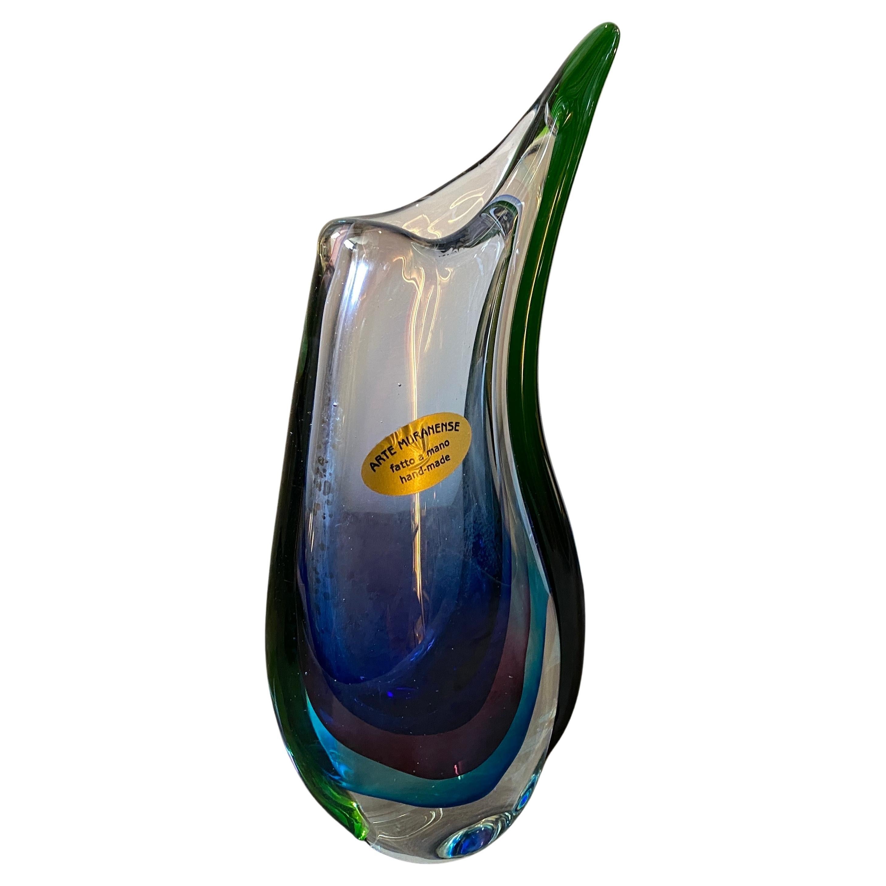 A blue, green and purple murano glass vase designed and manufactured in Italy in the Eighties by Vincenzo Nason, its acid signed on the bottom and labeled on a side. The vase it's in perfect condition the sommerso technique, It is a decorative
