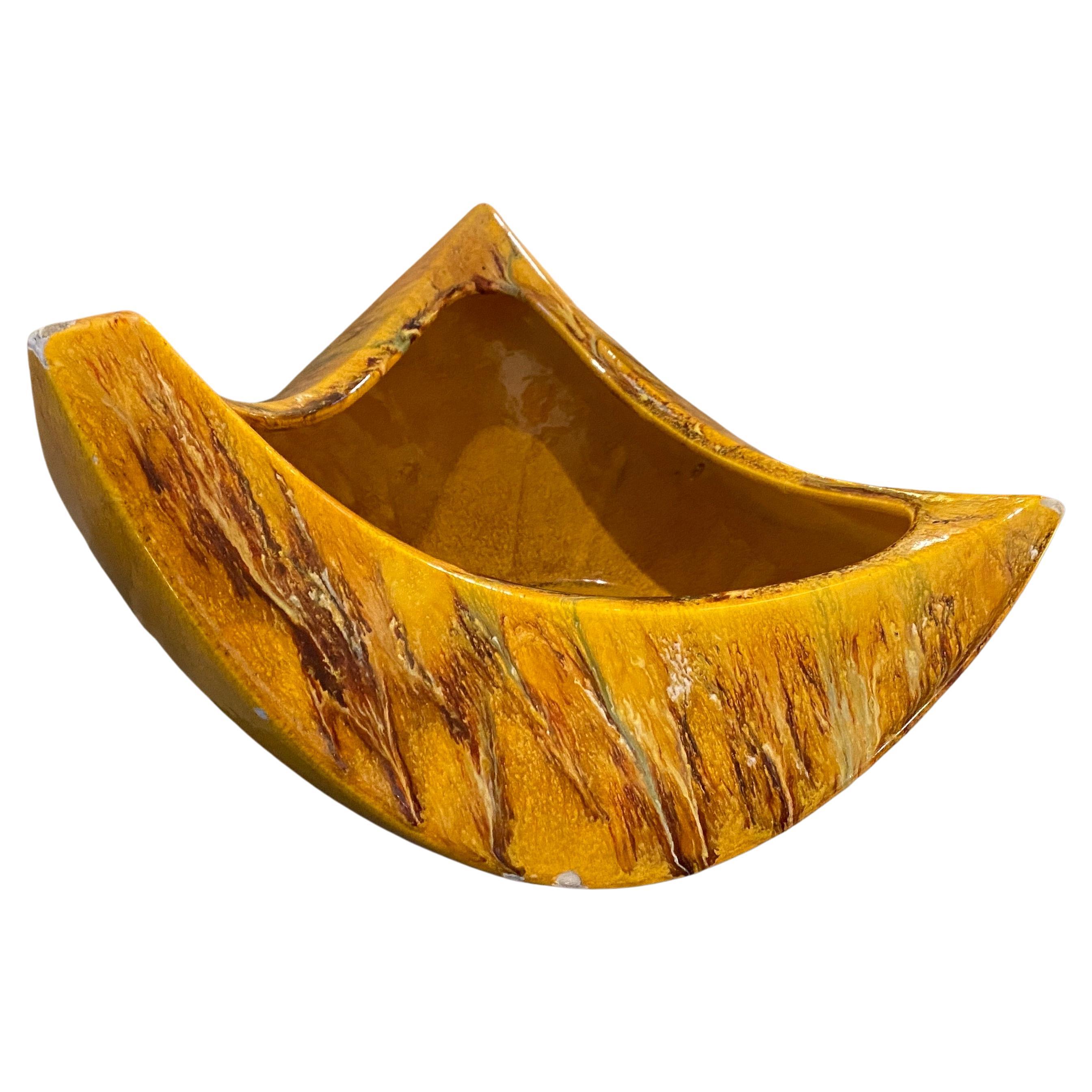 An amazing yellow ceramic centerpiece manufactured and hand-painted in Italy in the Seventies, designs by Bertoncello, italian famous manufacturer of the period. the centerpieces it has signs of use and age visible on the photos.