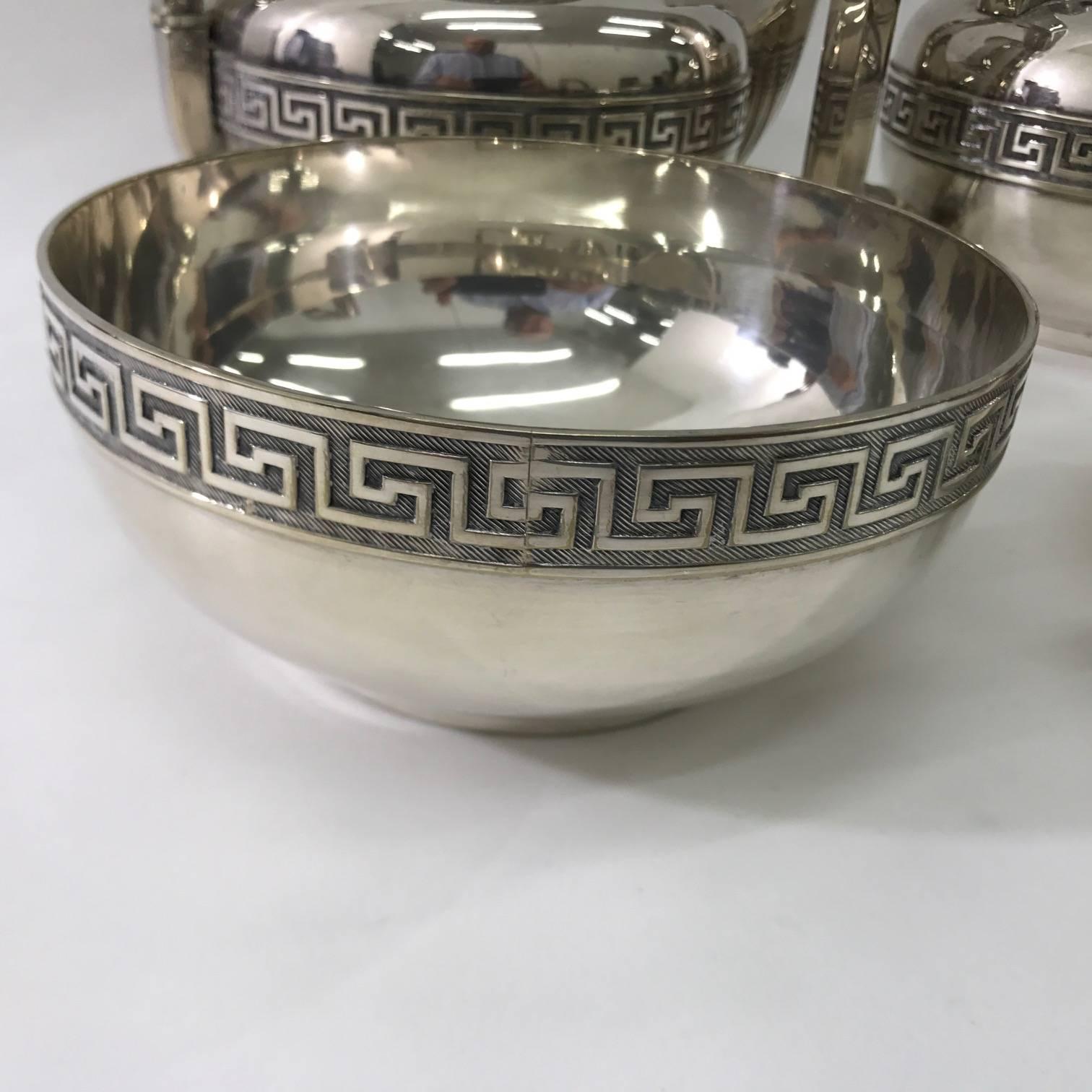 Linear and elegant set. 4 pieces in silver plated. It is composed of coffee pot, tea pot, sugar bowl and milk server, the objects have excellent proportions, are worked with extreme care, the handles have a  very refined shape, a pleasant and sober