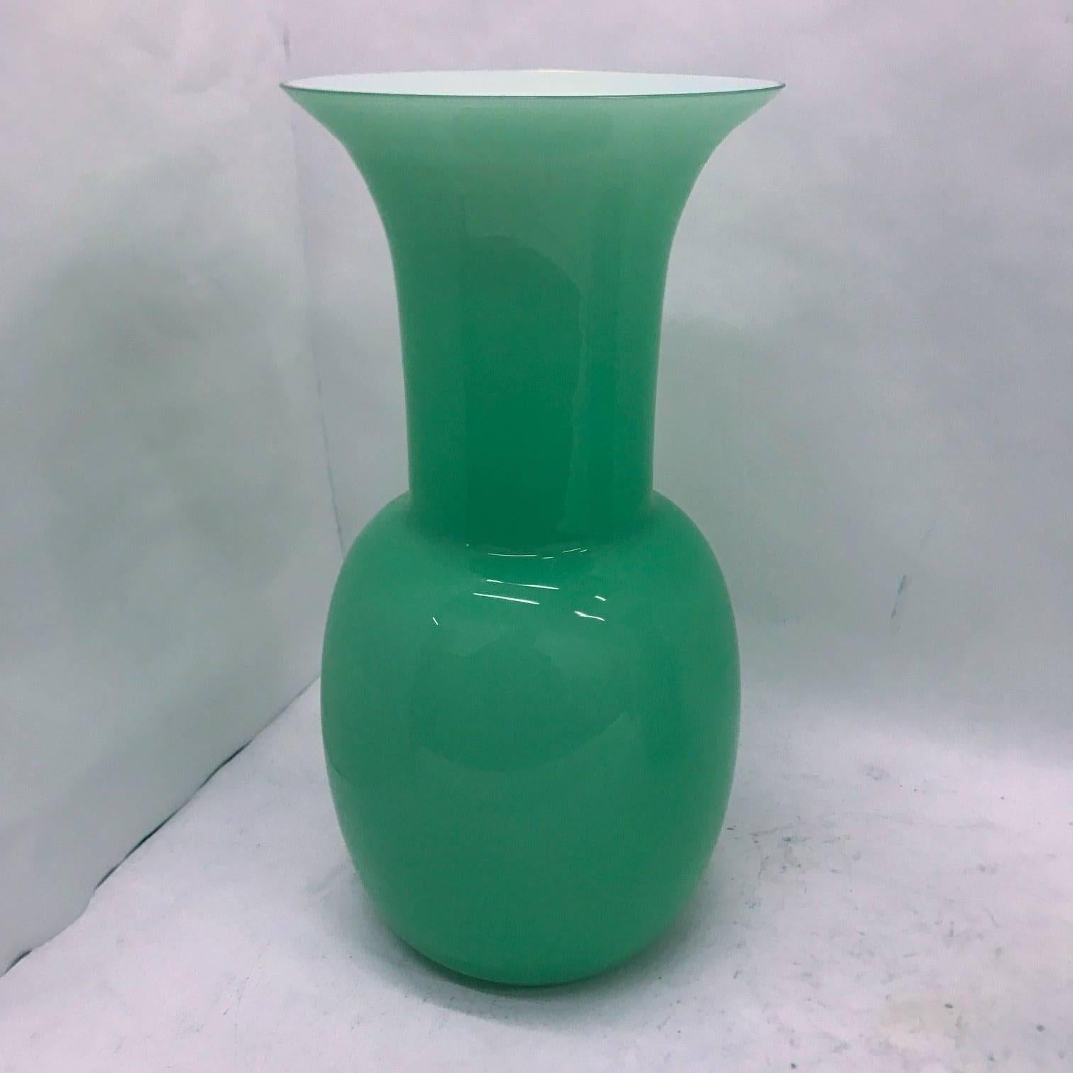 Pair of Murano glass vases signed by Aureliano Toso, made in 2001, green color and white inside, good conditions overall.