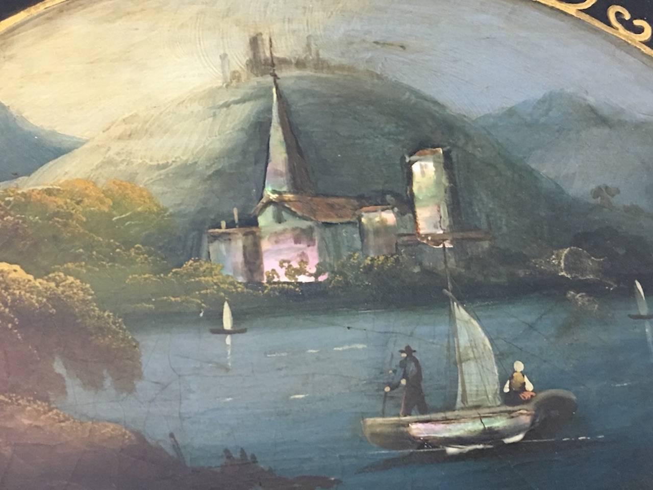 Particular English papier mâché tray with a painting at the centre in good conditions overall.