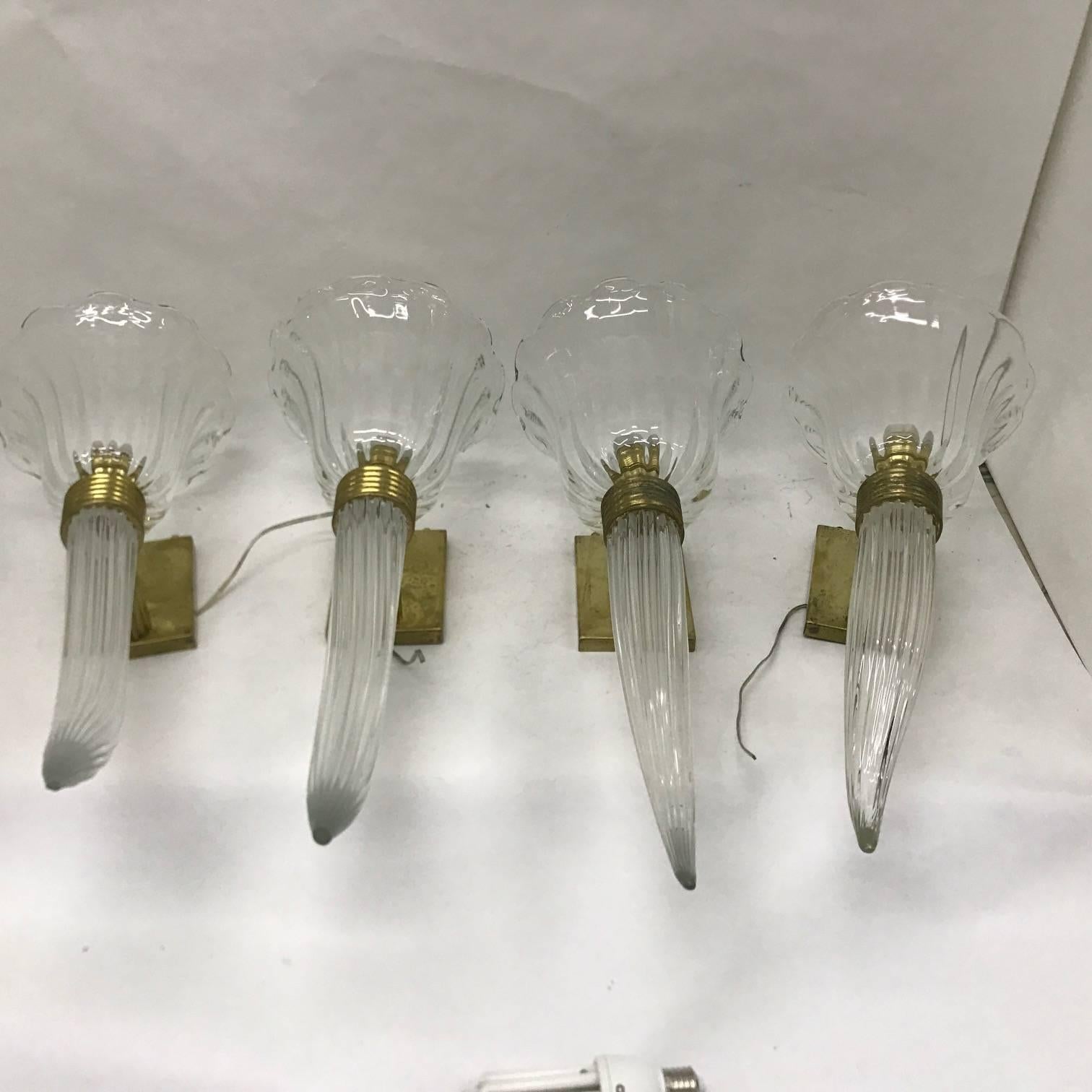 Four Murano glass and brass sconces, made in Italy in the 1960s, good conditions overall.