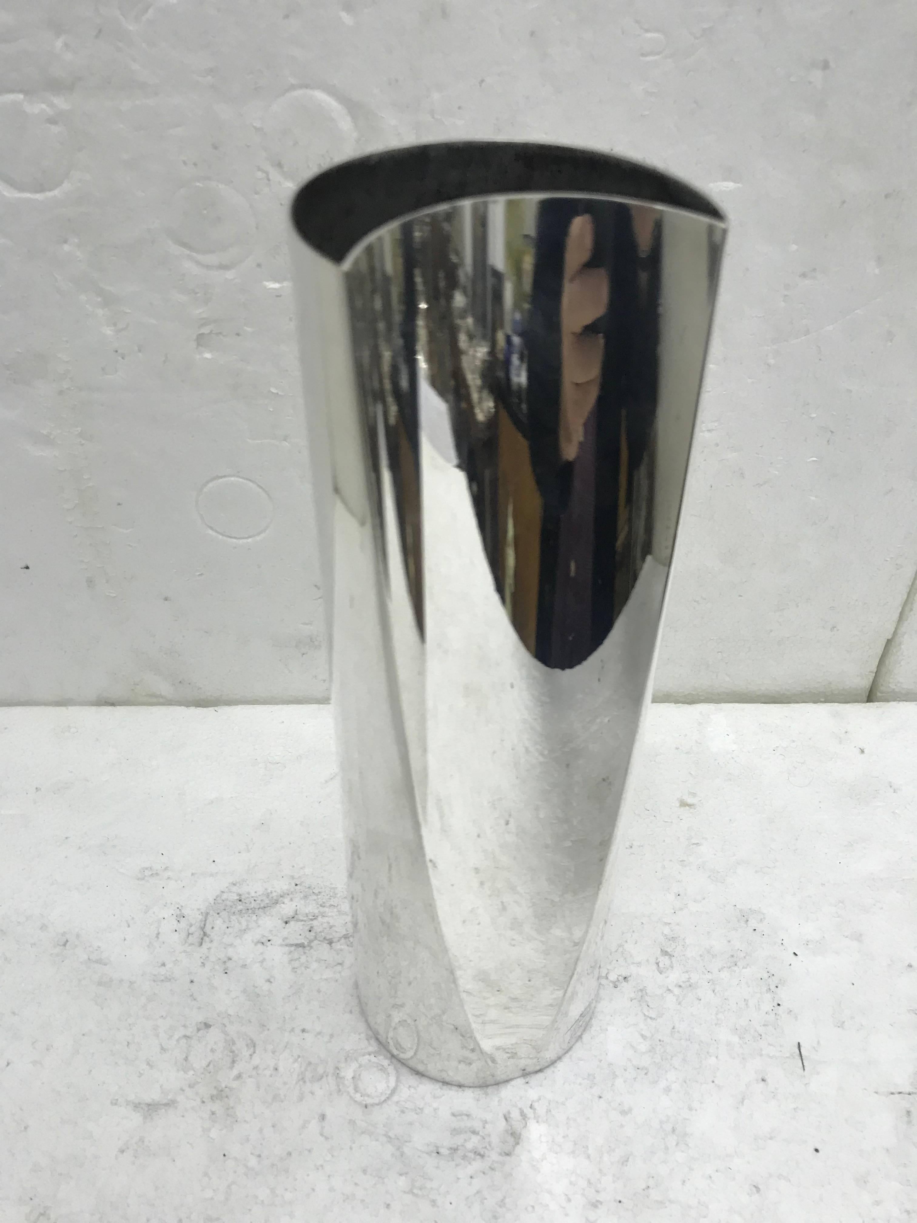 Elegant vase by Iconic Italian designer and metalsmith, Lino Sabattini. Silver plated vase Marked 'Sabattini' & 'Made in Italy' circa 1970. Also marked 'Baruffa' on the side, probably the shop who sold the item.