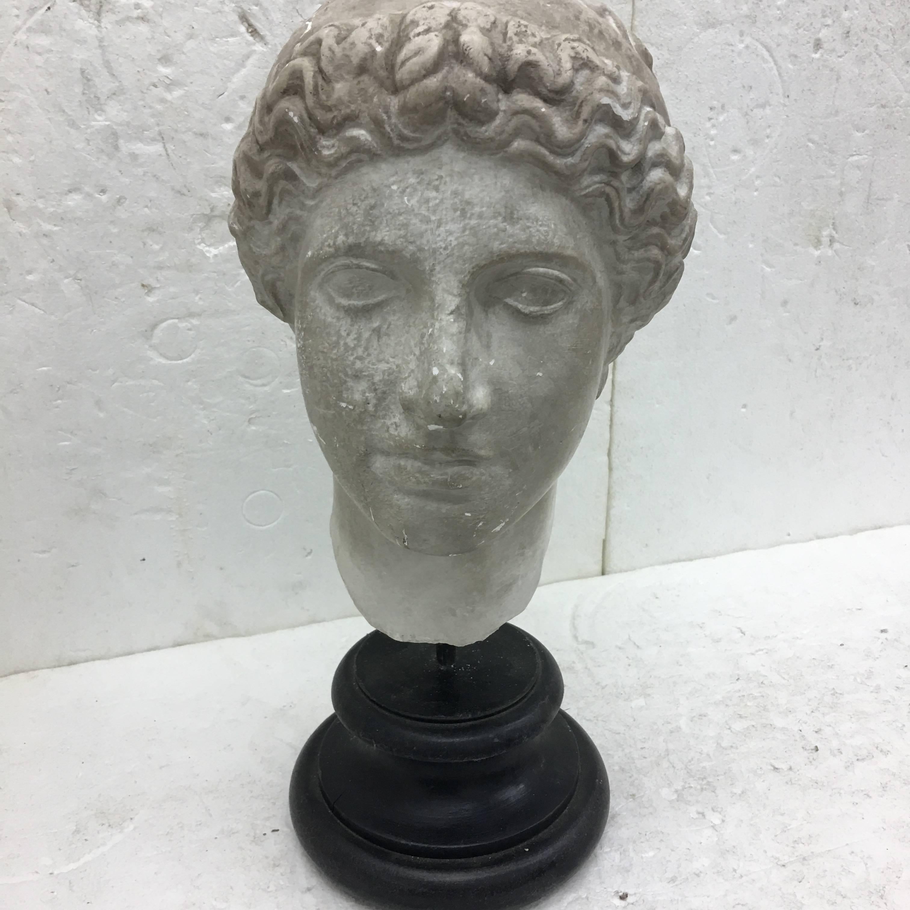 Particular school study plaster head on a black wood base, made in Italy in circa 1930.