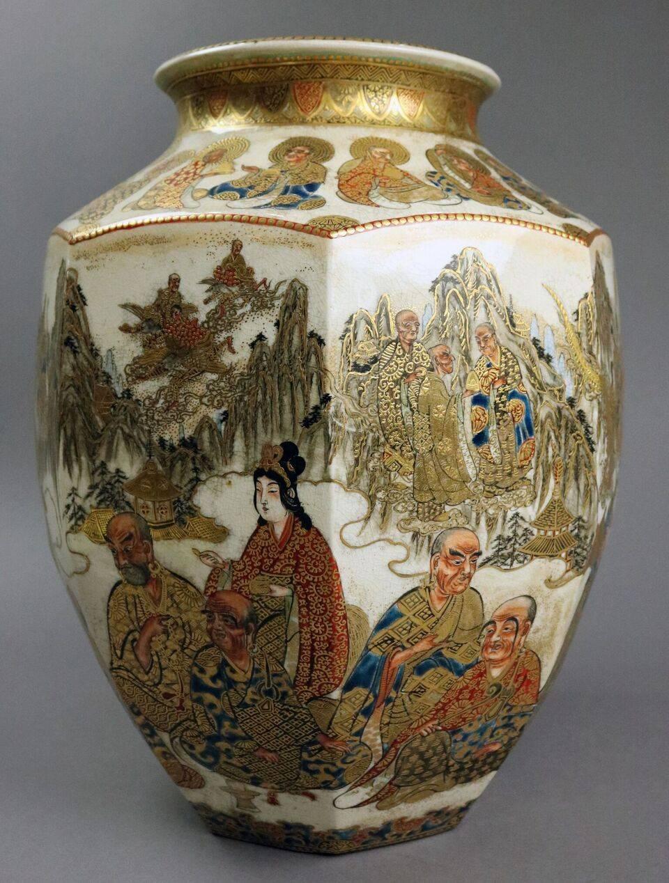 Japanese ceramic Satsuma vase of the Meiji period features hand-painted moriage and gold gilt village scenes, early 19th century