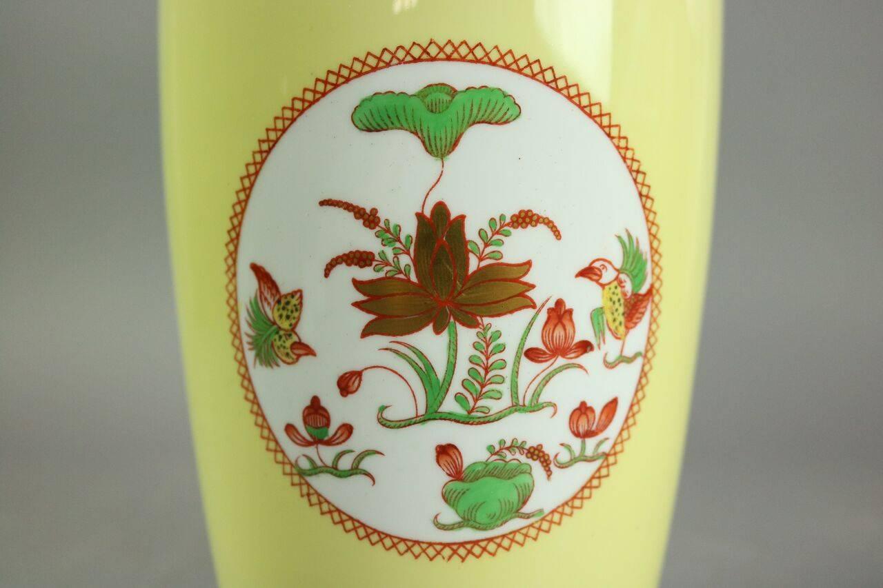 Antique Tiffany & Co. porcelain vase features Aesthetic style floral decoration on yellow ground with gold gilt banding. Stamps on base read "Spode Copeland's China England" and "Tiffany & Co. New York", circa 1900.