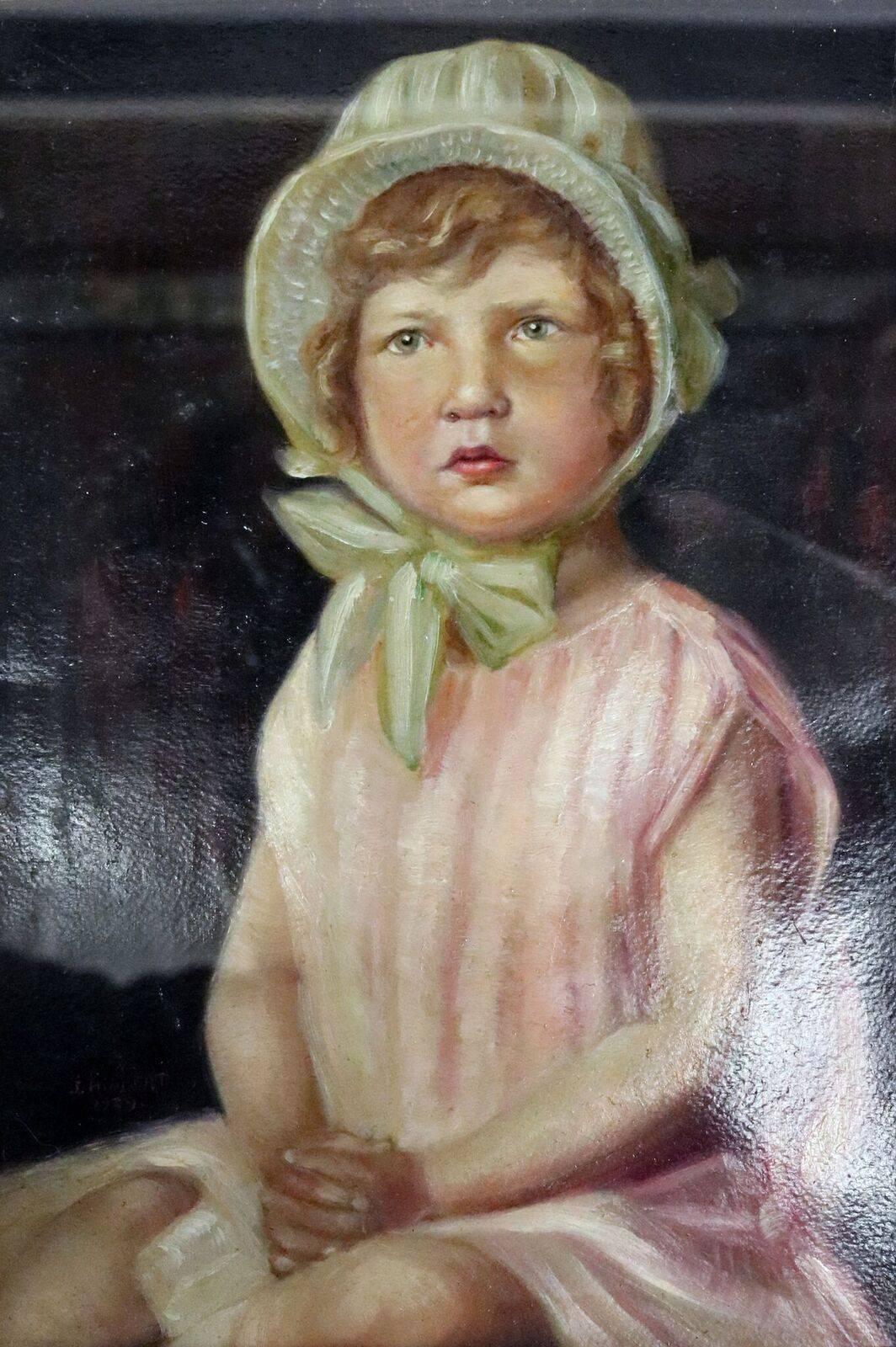 Antique framed oil on canvas painting of young girl in a bonnet and pink gown by listed artist Joseph Hilpert (1895-1975), signed and dated lower left, 1929.
Measures: 15