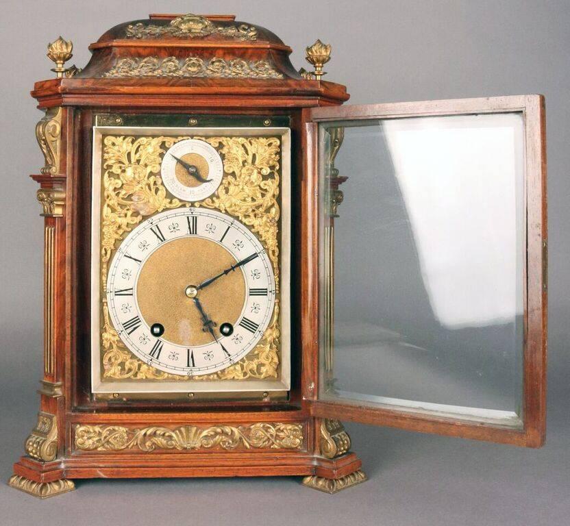 Antique Lenzkirch quarter-strike bracket clock features burl walnut case and bronze mounts with arched dial and gong strike, no 259093, circa 1880. Clock in working condition.