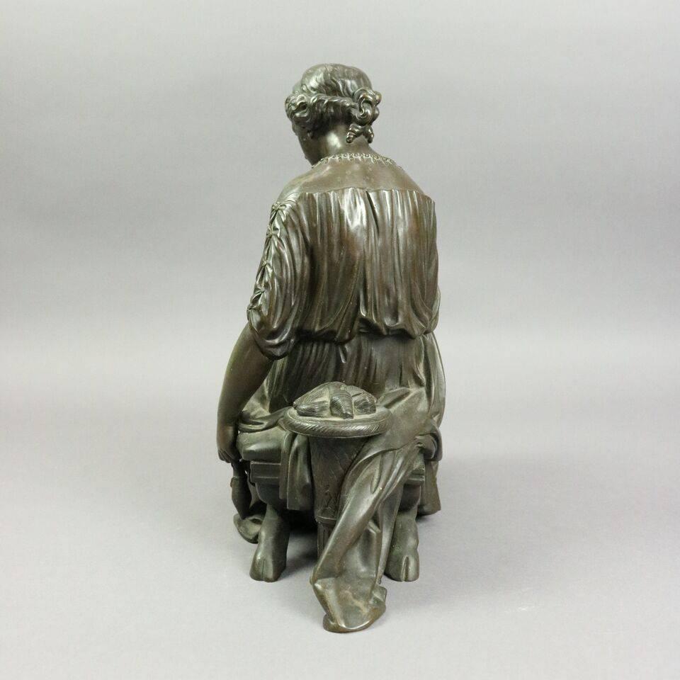 Antique Classical French figural bronze sculpture depicts recumbent pensive maiden, inscribed DEFEVILLE in base, circa 1880.