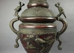 Antique Japanese Meiji Figural Bronze Floor Urn with Dragons, Birds and Floral