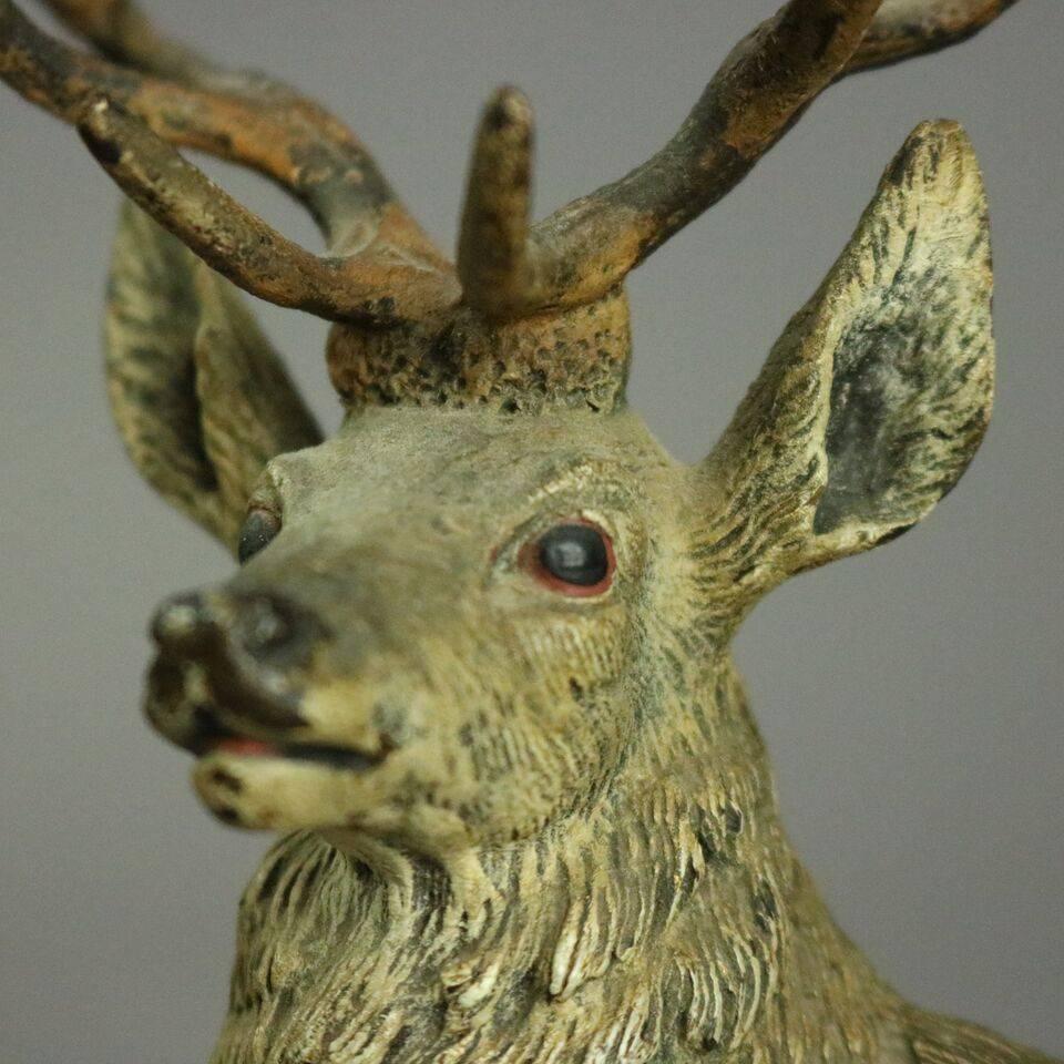 Antique Franz Bergmann School bronze cold painted ten-point elk/deer/stag, stamped Geschutzt, circa 1900

Measures: 8.5" H; x 7.75" W x 1.5" D.