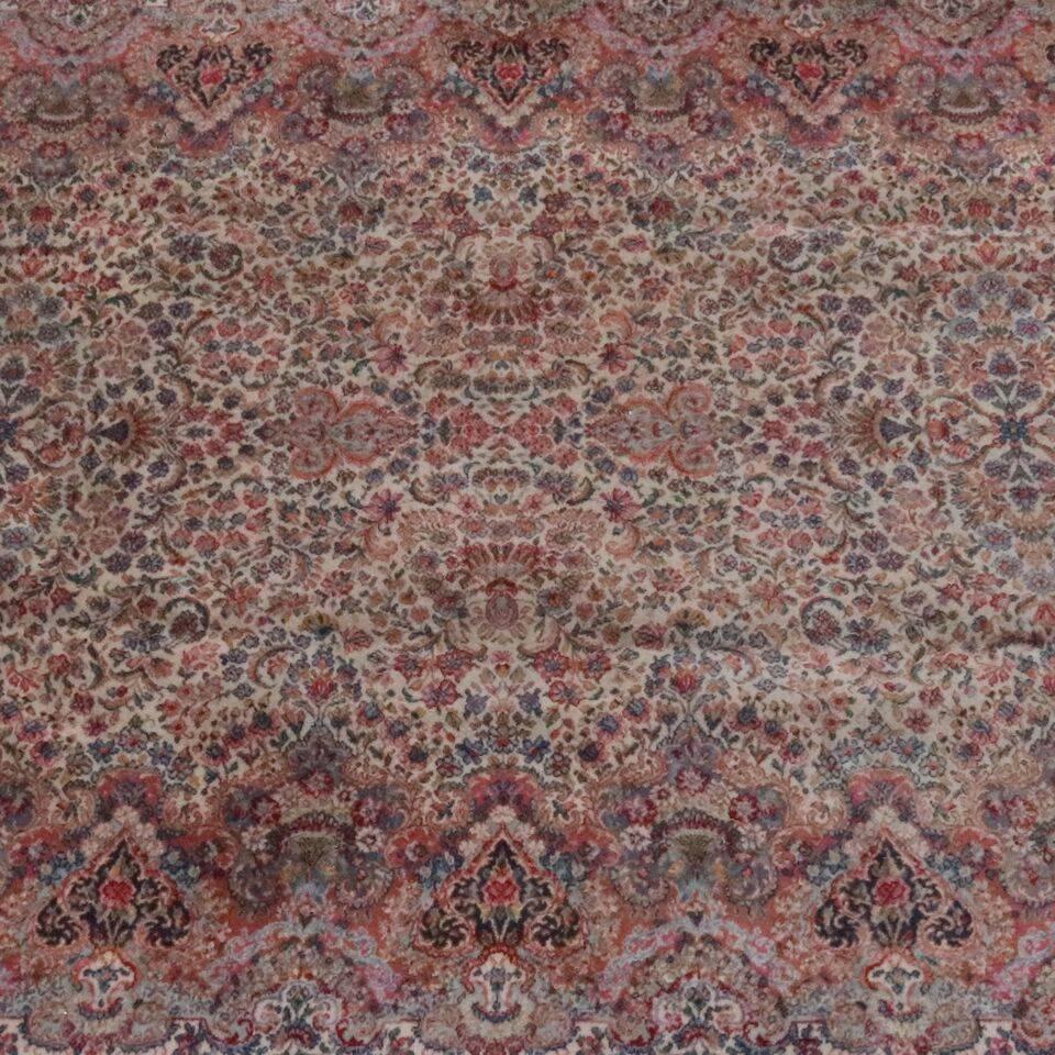 Vintage Karastan Kirman pattern #759, wool, all-over floral motif in pastels on cream ground, circa 1950.

Measures; 218" x 102".