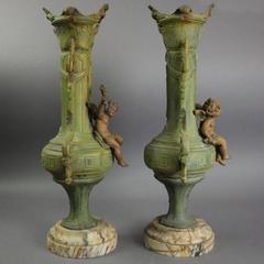 Pair of Large Antique Classical Polychromed Metal and Marble Cherubi Urns