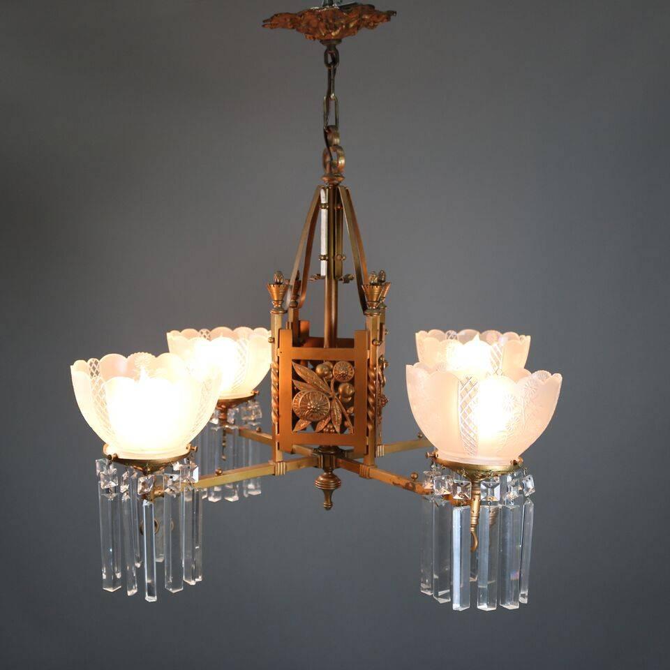 Antique Aesthetic Movement Charles Parker or Bradley Hubbard School four-arm chandelier features pierced cube body of stylized floral panels and twisted corner columns with four arms terminating in cut crystal decorated lights with frosted floral