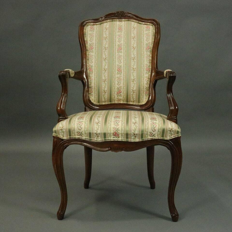 Set of six vintage Borghese collection French County / Louis XV style dining chairs include two armchairs and four side chairs and feature cherry frame with carved floral crests and striped upholstery with floral and lute design, underside