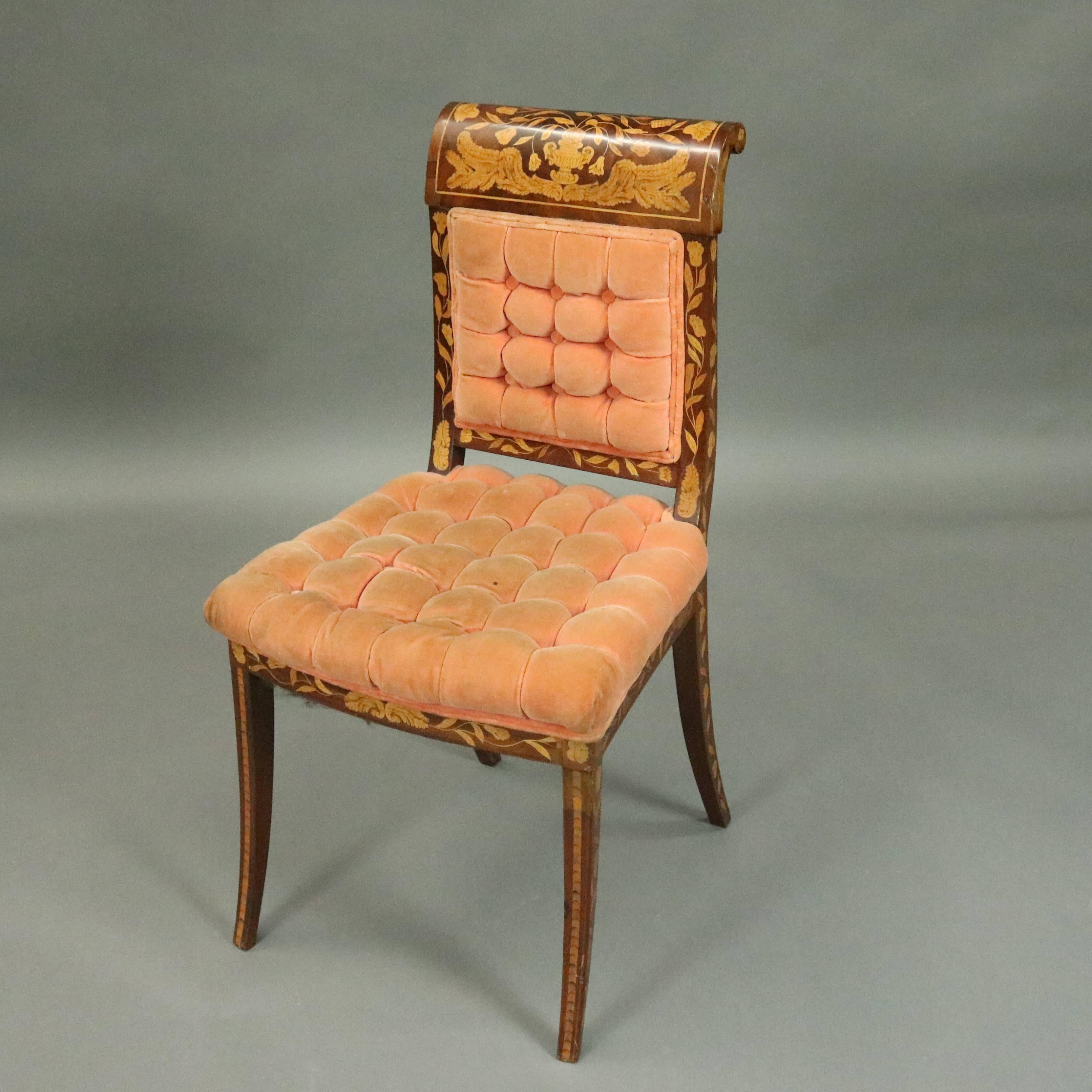 Antique Dutch marquetry side chair features mahogany construction with banding and all-over foliate satinwood inlay, buttoned upholstered seat and back, circa 1890.

Measures: 36" H x 18" W x 15" D x 19" seat height.