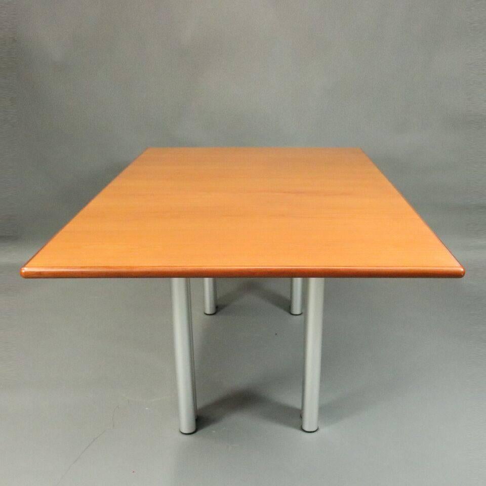 Mid-Century Modern dining table by Knoll features teak wood top supported by tubular silver powder coated aluminum legs, circa 1950

***DELIVERY NOTICE – Due to COVID-19 we are employing NO-CONTACT PRACTICES in the transfer of purchased items. 