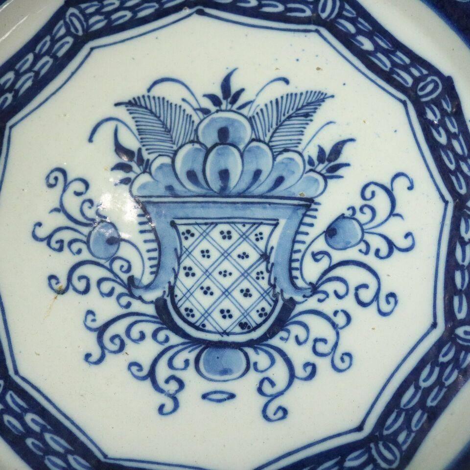 18th century antique Continental soft paste porcelain charger with hand-painted Corbeille a fleurs (basket of flowers) in cobalt blue on white ground.

Measures: 12" diameter x 3" height.