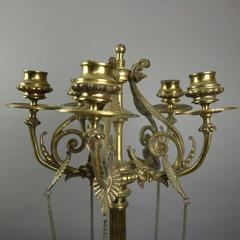 Pair of Antique Figural Bronze Five-Light Column Candelabra, Winged Lion Design