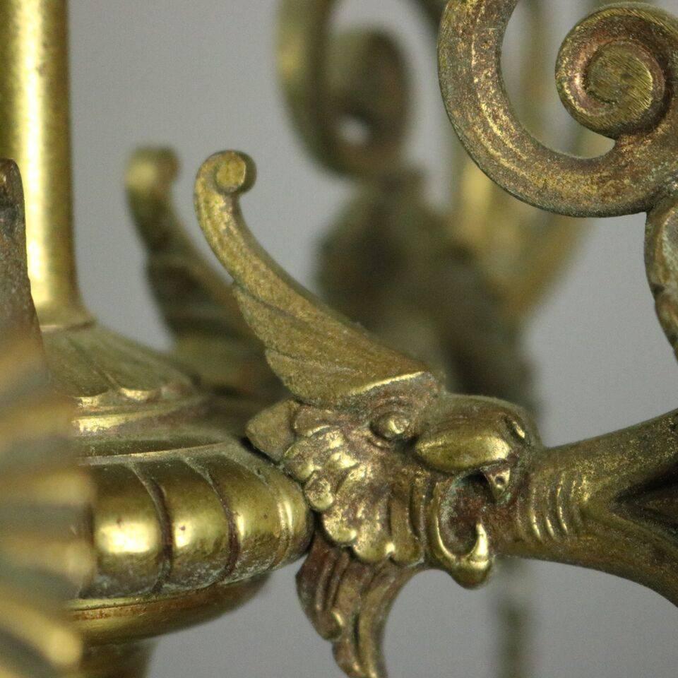 European Pair of Antique Figural Bronze Five-Light Column Candelabra, Winged Lion Design