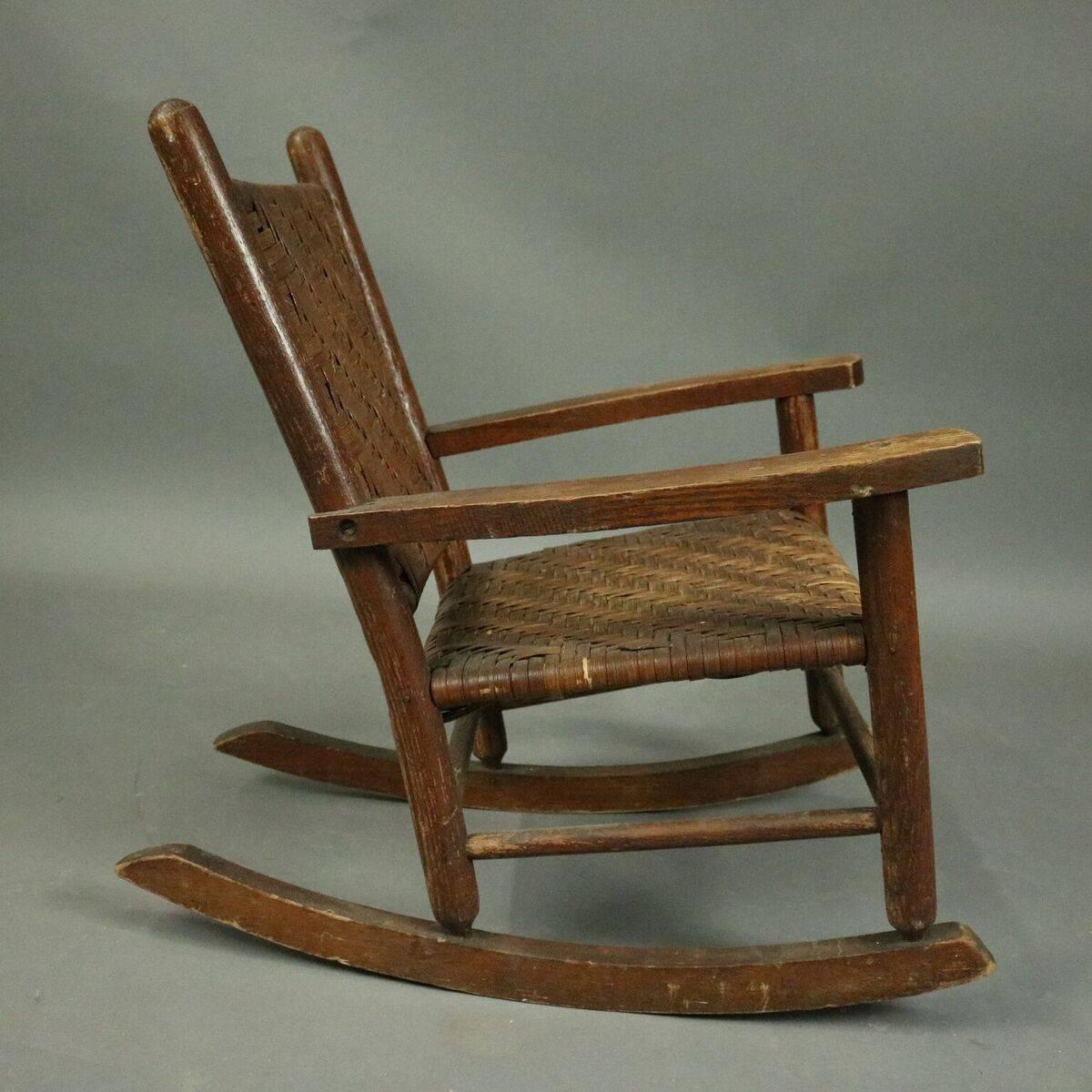 antique rocking chair with woven seat