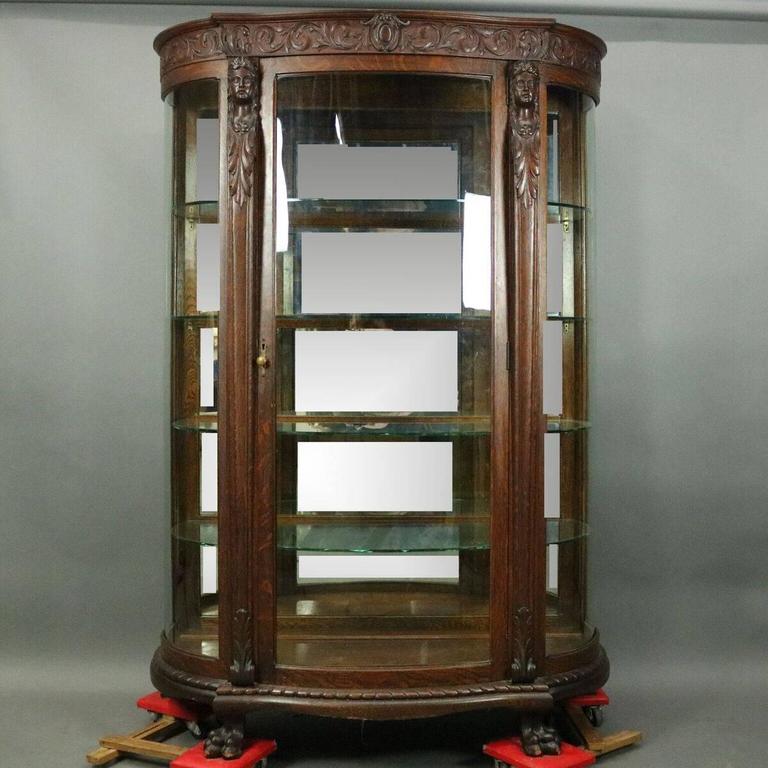 R J Horner Bros Figural Carved Oak Mirror Back China Cabinet American R J Horner Bros Figural Carved Oak Mirror Back China Cabinet Circa 1890 For